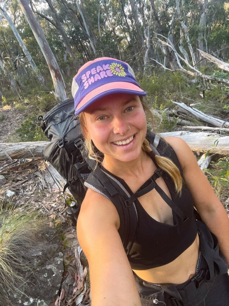 My Solo Hike for Mental Health Along 330km of the Aus Alps Walking Track, Photo by Elise Marcianti, food drop, food tub, hiker, smiling