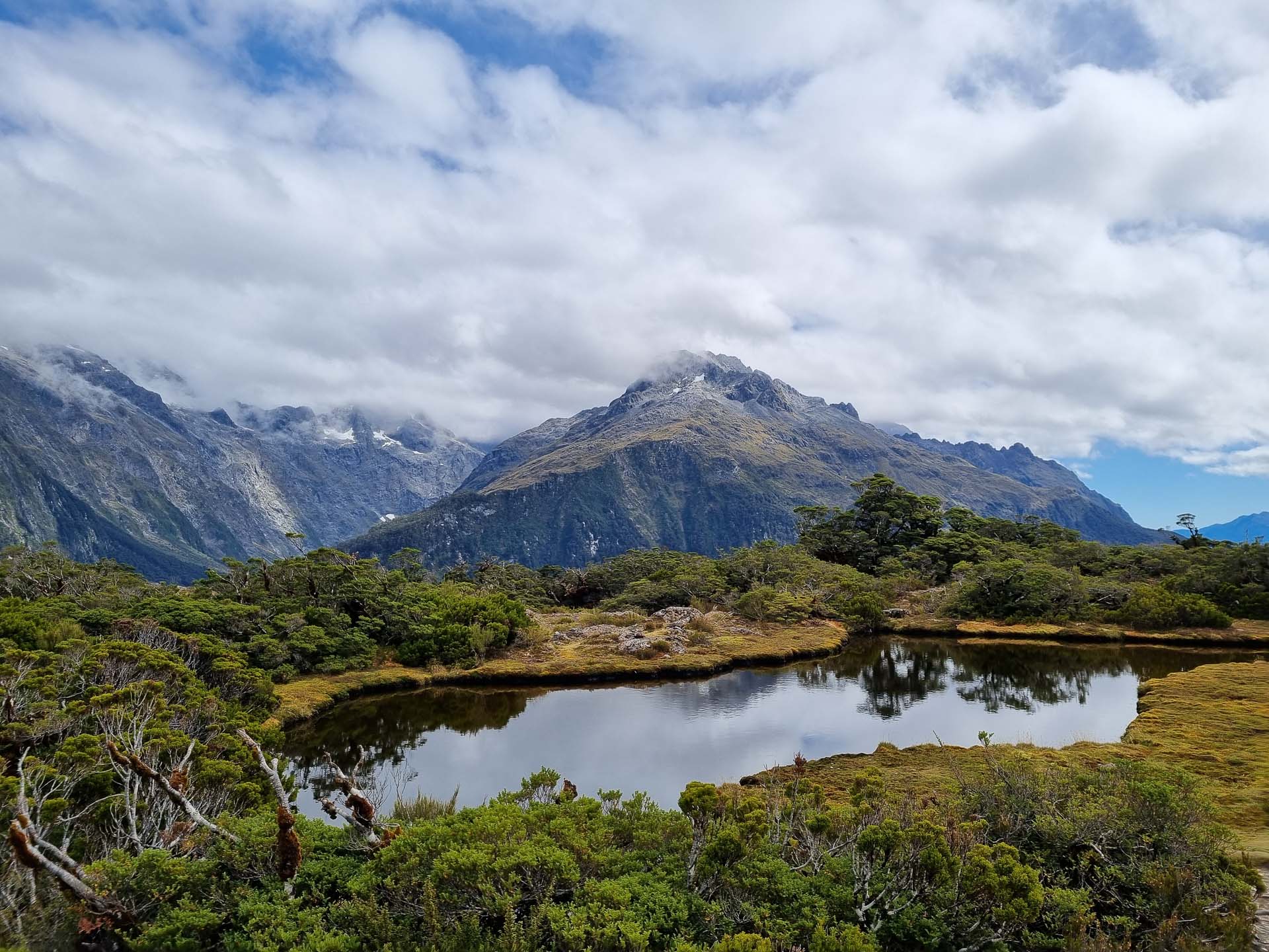 The Greenstone-Caples Track Is The Most Dynamic Hike in New Zealand, Photo by Lachlan Pearce, multi-day hike, new zealand hike, alpine hiking, back country hiking, mountain lake on the greenstone-caples track