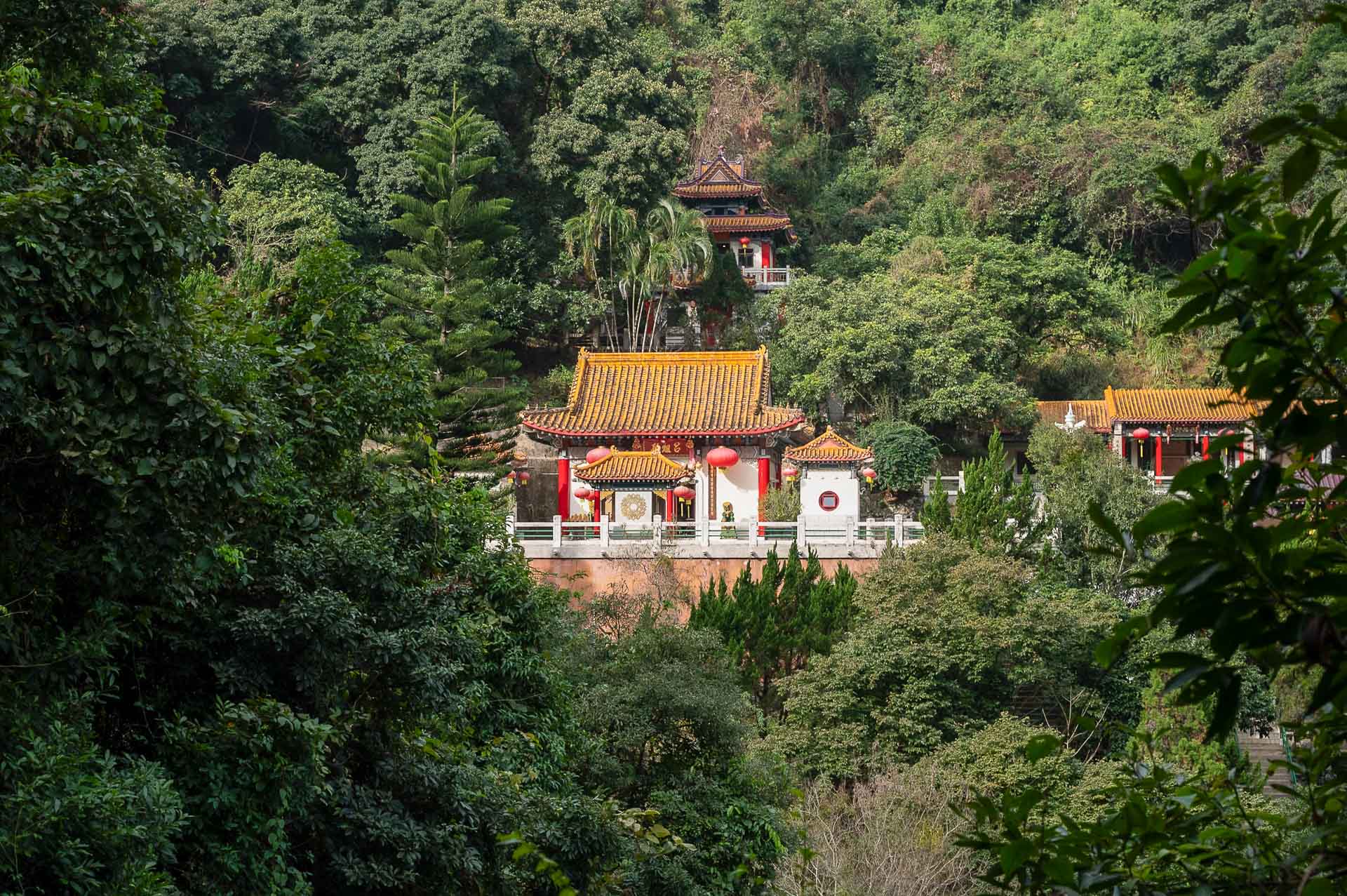Mountains, Islands, and Deserted Beaches: Travel Hong Kong Like an Explorer , Photo by Cam Bostock, hong kong, international, travel guide, temple seen on the tai mo shan + ng tung chai waterfall hike