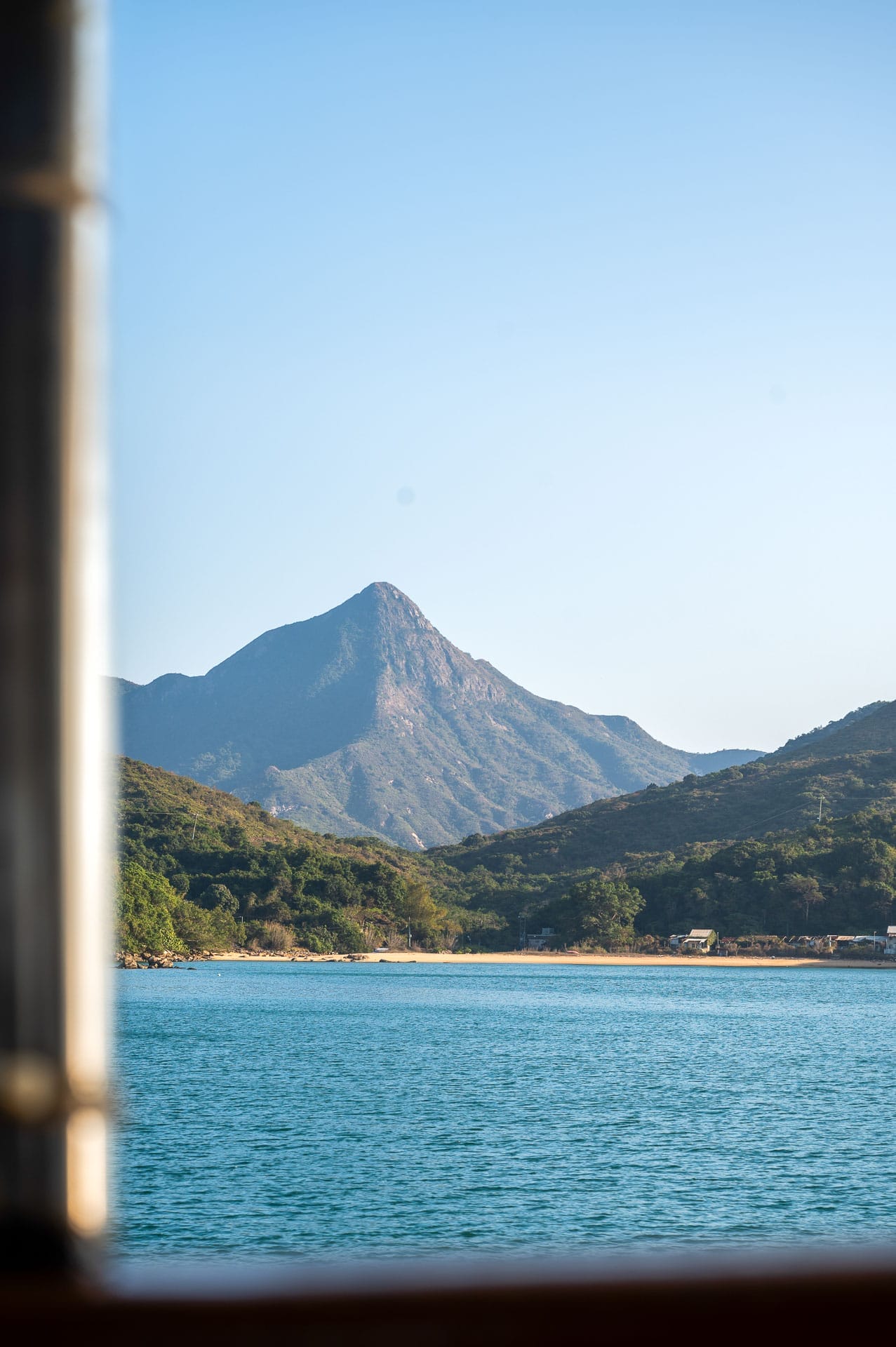 The Side of Hong Kong I Never Knew Existed, Photo by Cam Bostock, international, hong kong, sponsored, a mountain seen on the deserted beaches hike