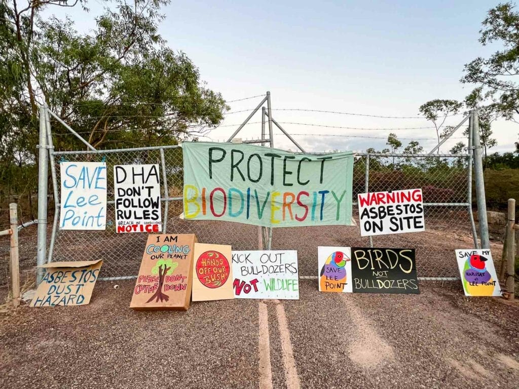 Lee Point Camp in Darwin is a Place of Decolonial Climate Activism, photo sourced from Friends of Lee Point, indigenous, aboriginal, activism, darwin, colourful activism signs at lee point