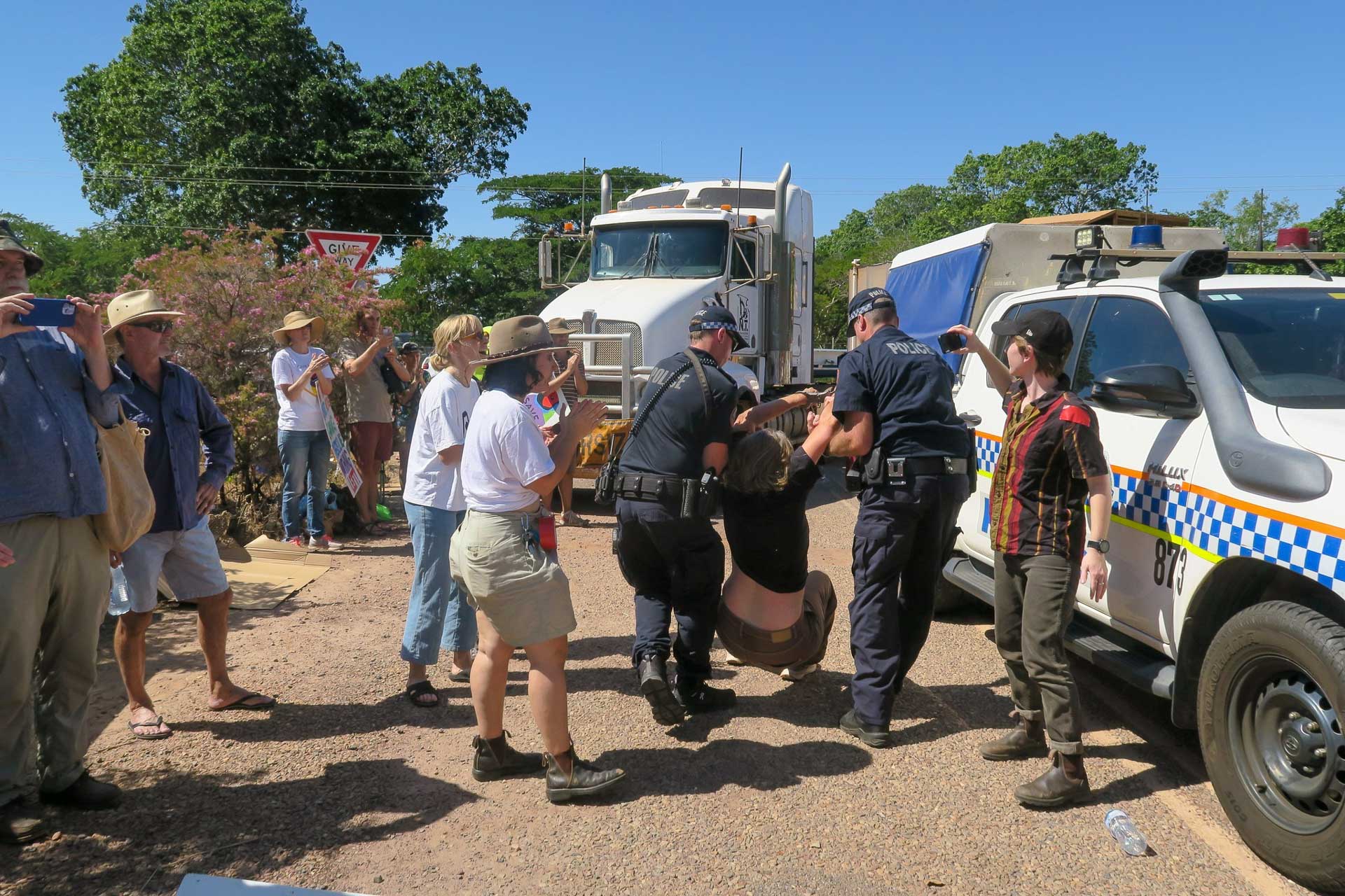 Lee Point Camp in Darwin is a Place of Decolonial Climate Activism, photo sourced from Friends of Lee Point, protestors, lee point, darwin, police removing protesters at the lee point site