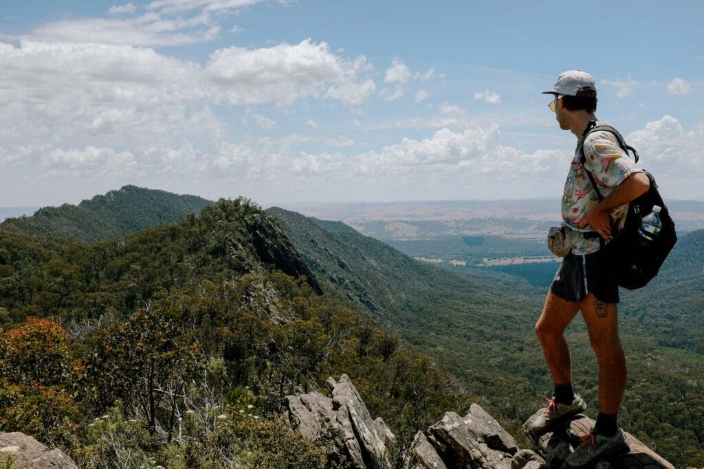 ‘I Can’t Take Much More Of This CRaPT’: Tackling the Cathedral Ranges Peaks Trail in a Day, Photo by Taylor Bell, victoria, day hike,hiker standing on rocky outcrop