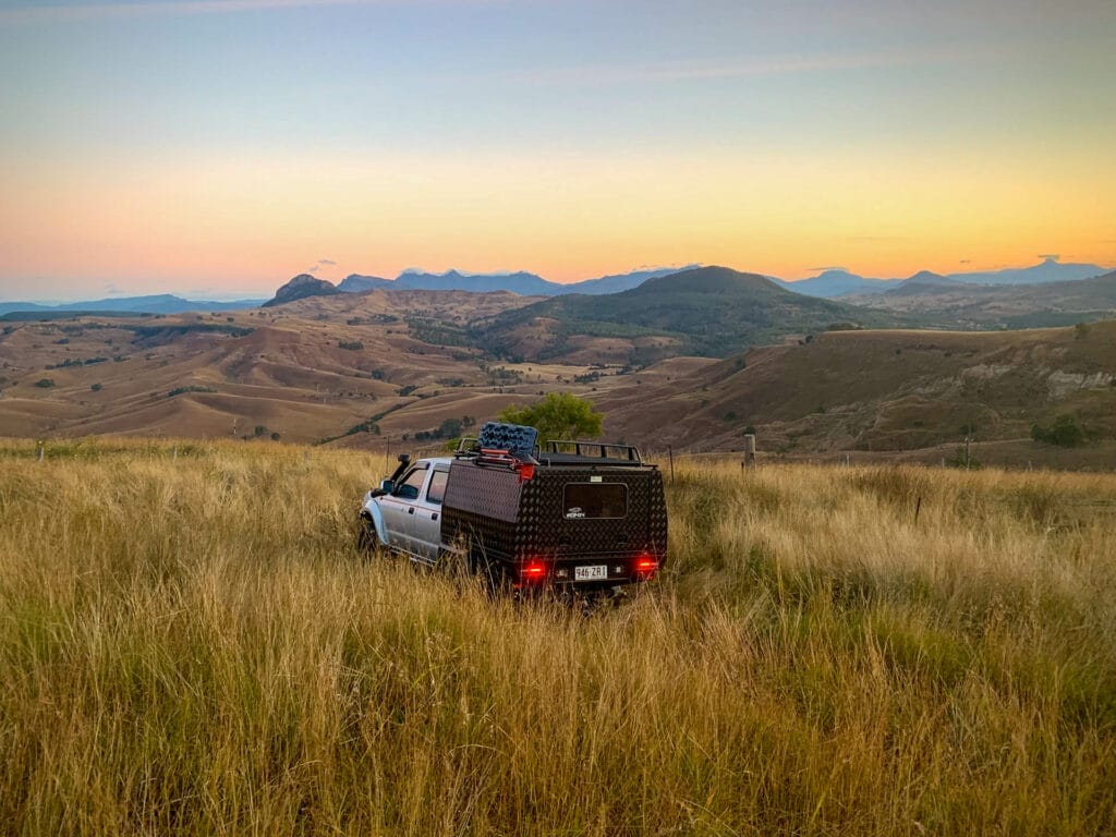 9 Things to Think About Before Your First 4WD Trip, Photo by Glenna Goldman, car, camping, green hills, sunset, rolling hills, grass