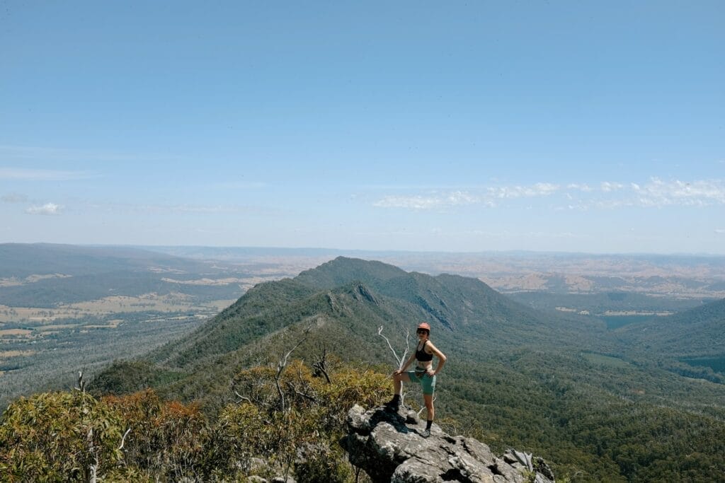 ‘I Can’t Take Much More Of This CRaPT’: Tackling the Cathedral Ranges Peaks Trail in a Day, Photo by Taylor Bell, victoria, day hike,hiker map, hiker standing on rocky outcrop