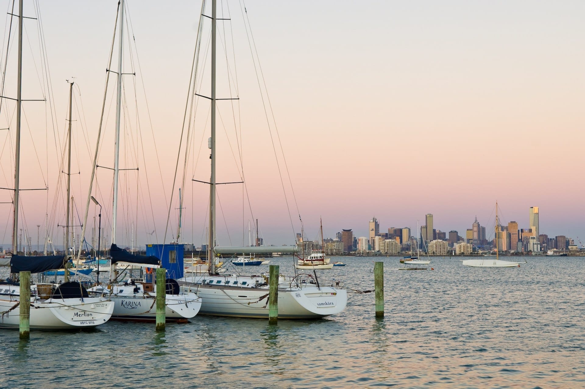 Best walks in Melbourne, Photo via Visit Victoria, Sunset at Williamstown Pier, Hobsons Bay, boats