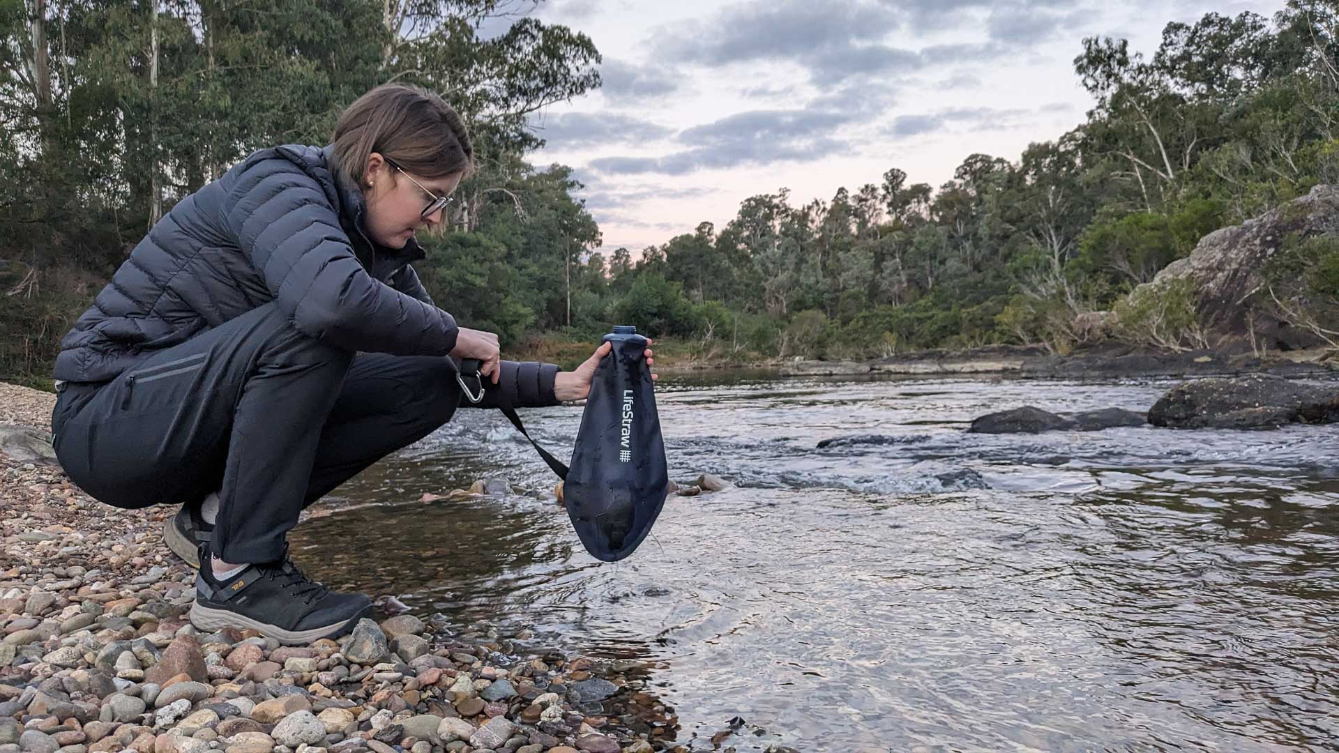 LifeStraw 3L Peak Series Compact Gravity Water Filter System - Reviewed & Tested, photo by @jessleenehme, hiker filtering water, collect water, water bladder