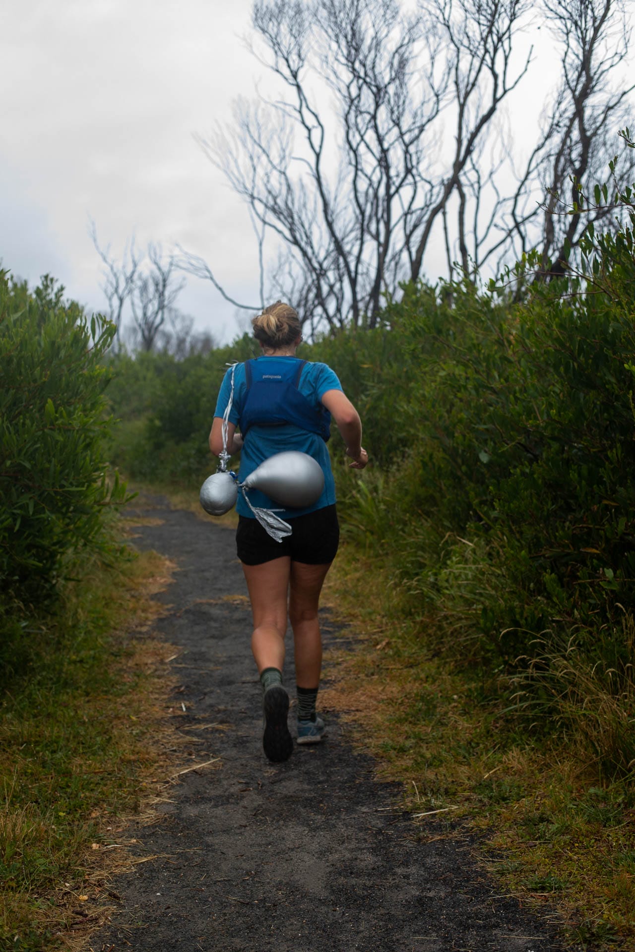 Hilary picking up rubbish along the Trail Image Calumn Hockey