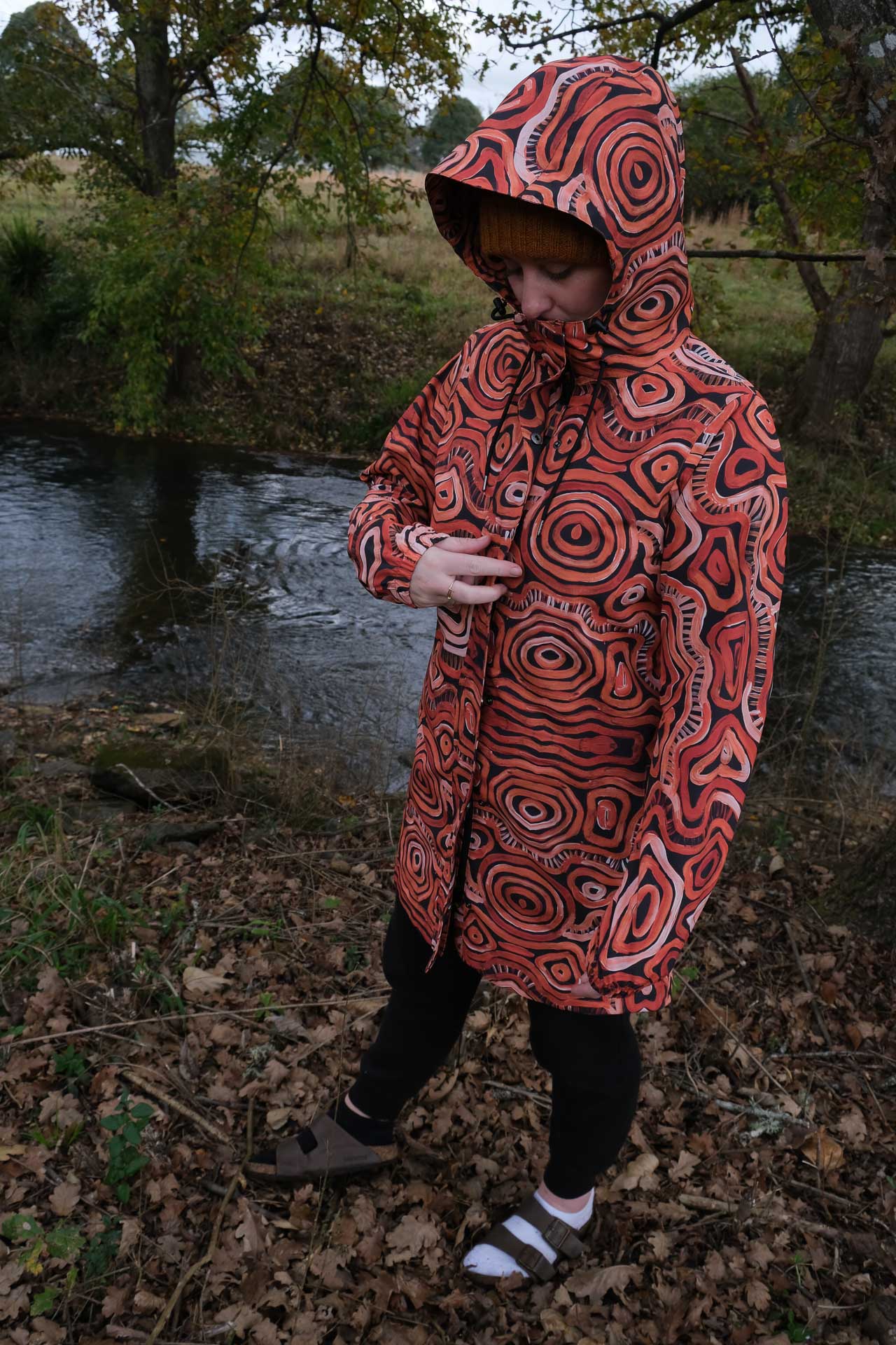 Amble Refuge Long Waterproof Jacket - Reviewed & Tested, photos by Anna Wall, raincoat, pose, socks, birkenstocks