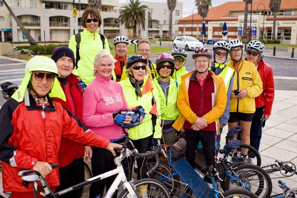Sustainable Port Phillip Bike Charity is Donating Bikes to People in Need, photo via Back2Bikes, community bike ride, cyclists, group, smiles