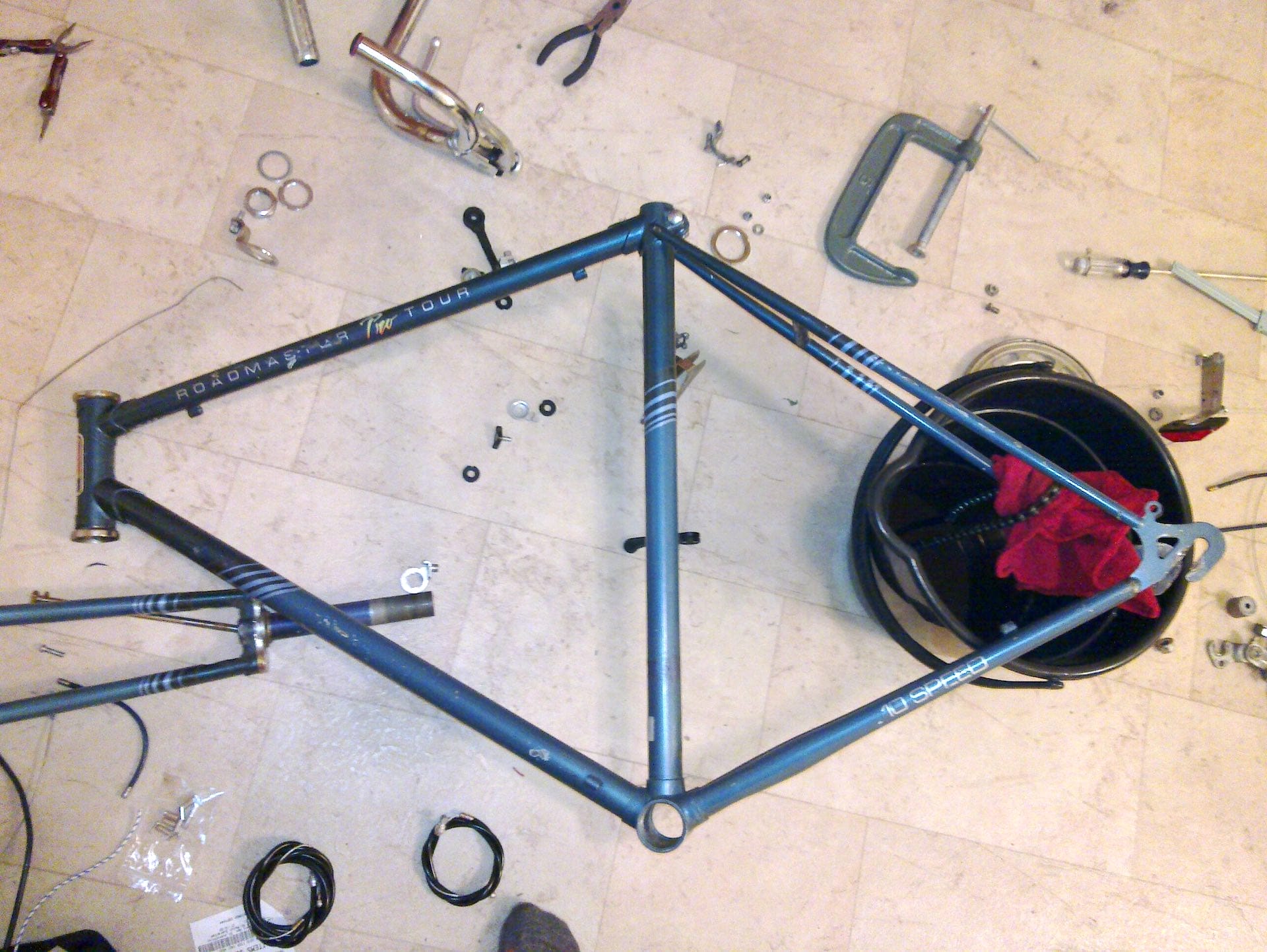 Sustainable Port Phillip Bike Charity is Donating Bikes to People in Need, photo via Flickr by David Nichols, bike parts, bike frame, flat lay