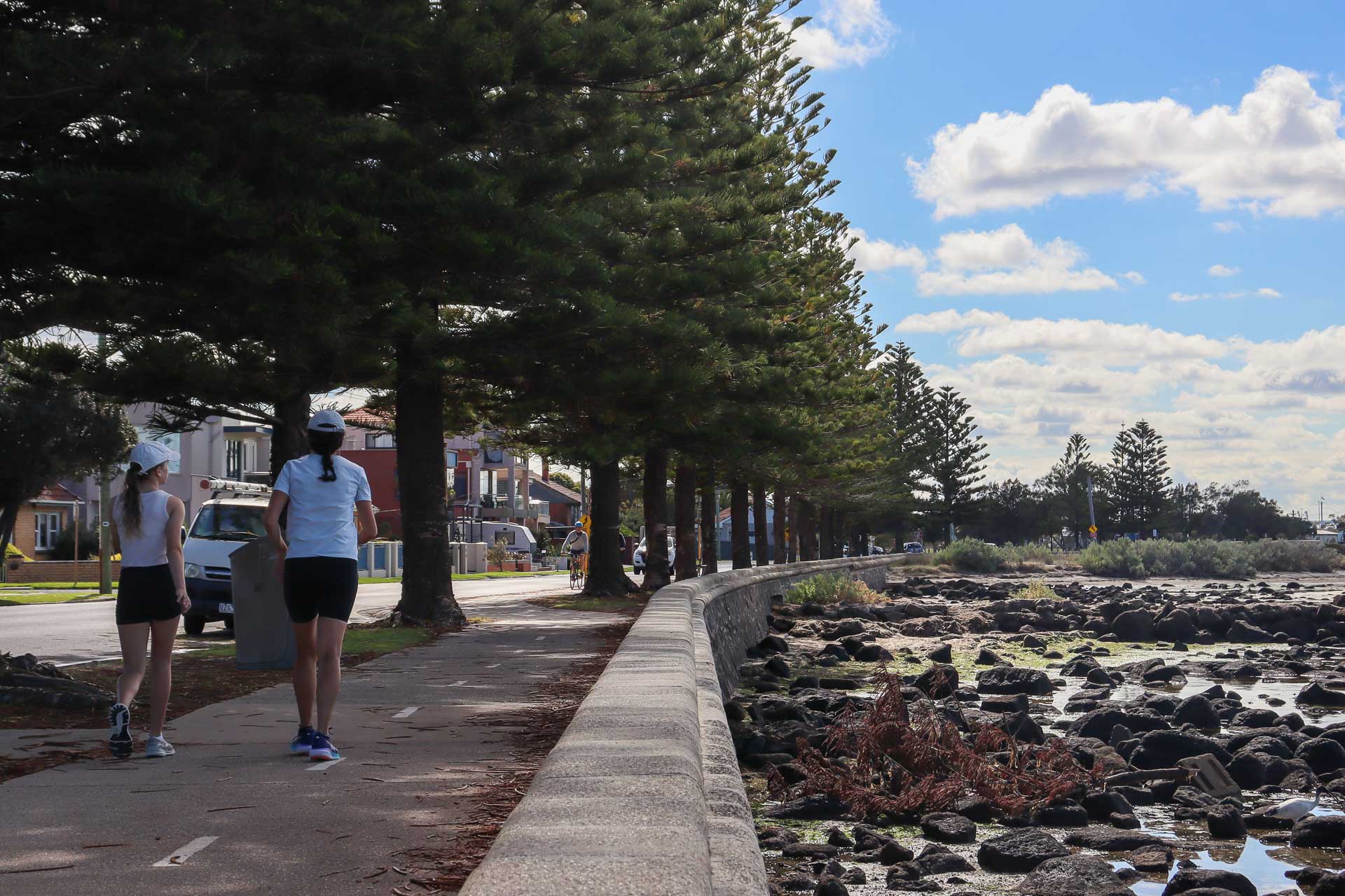 Combine History and Stunning Views on The Bay Trail in Melbourne’s Western Suburbs, Photo by Kat Barber, Altona Foreshore path, walkers, shade, Victoria