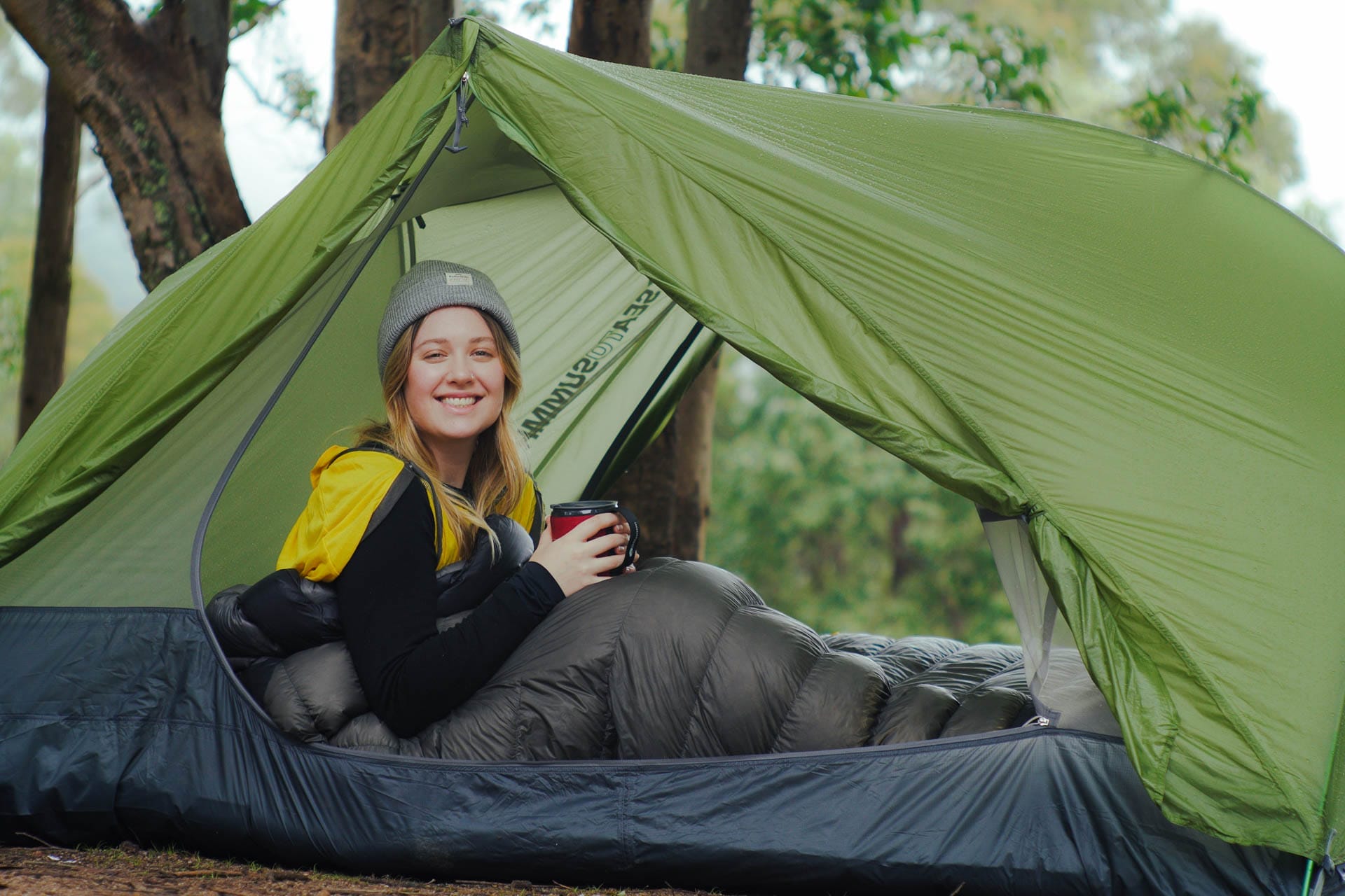 How to Choose a Sleeping Bag, Photo by @aebimedia, Sea to Summit, sponsored, Julia in a sea to summit sleeping bag sipping coffee
