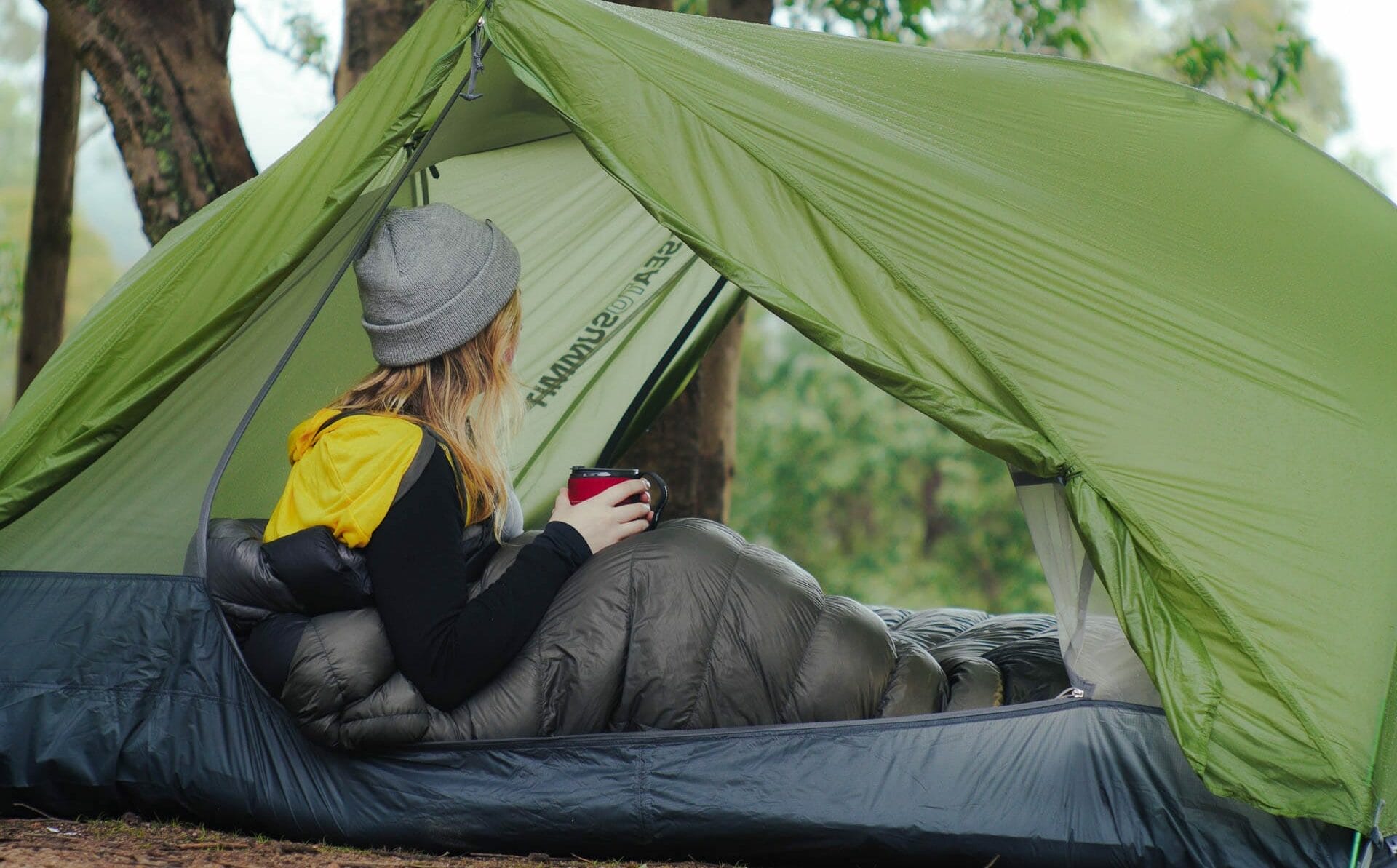 How to Choose a Sleeping Bag, Photo by @aebimedia, Sea to Summit, sponsored, Julia in a sea to summit sleeping bag and tent sipping coffee