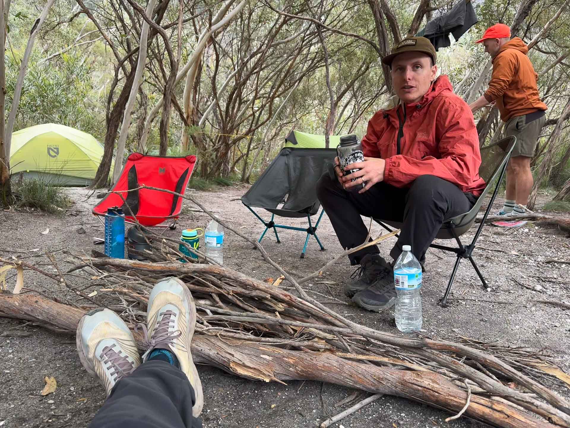 jack brookes, sitting on a chair, in the bush, nice