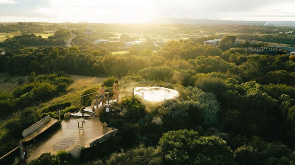 Top 6 Hot Springs in Victoria for a Relaxing Weekend Escape, Ben Savage, Peninsula Hot Springs, couple, friends, aerial view