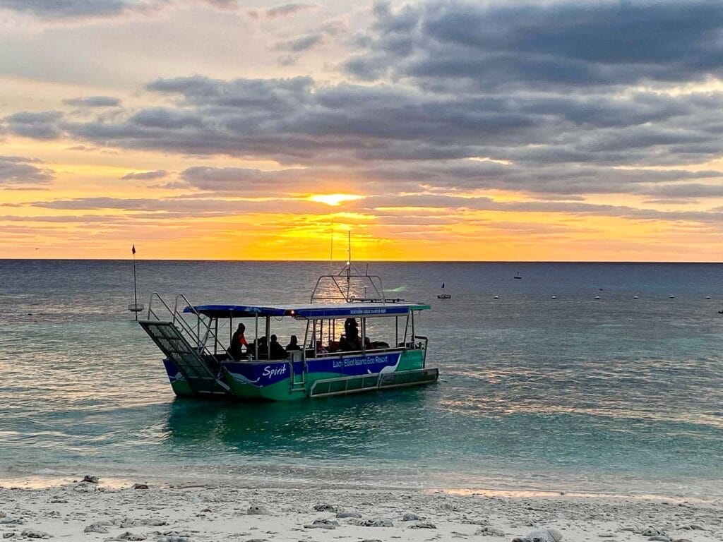 Paradise Found: Magic Awaits on Queensland's Lady Elliot Island, Shot by Sharon Cribb, boat,