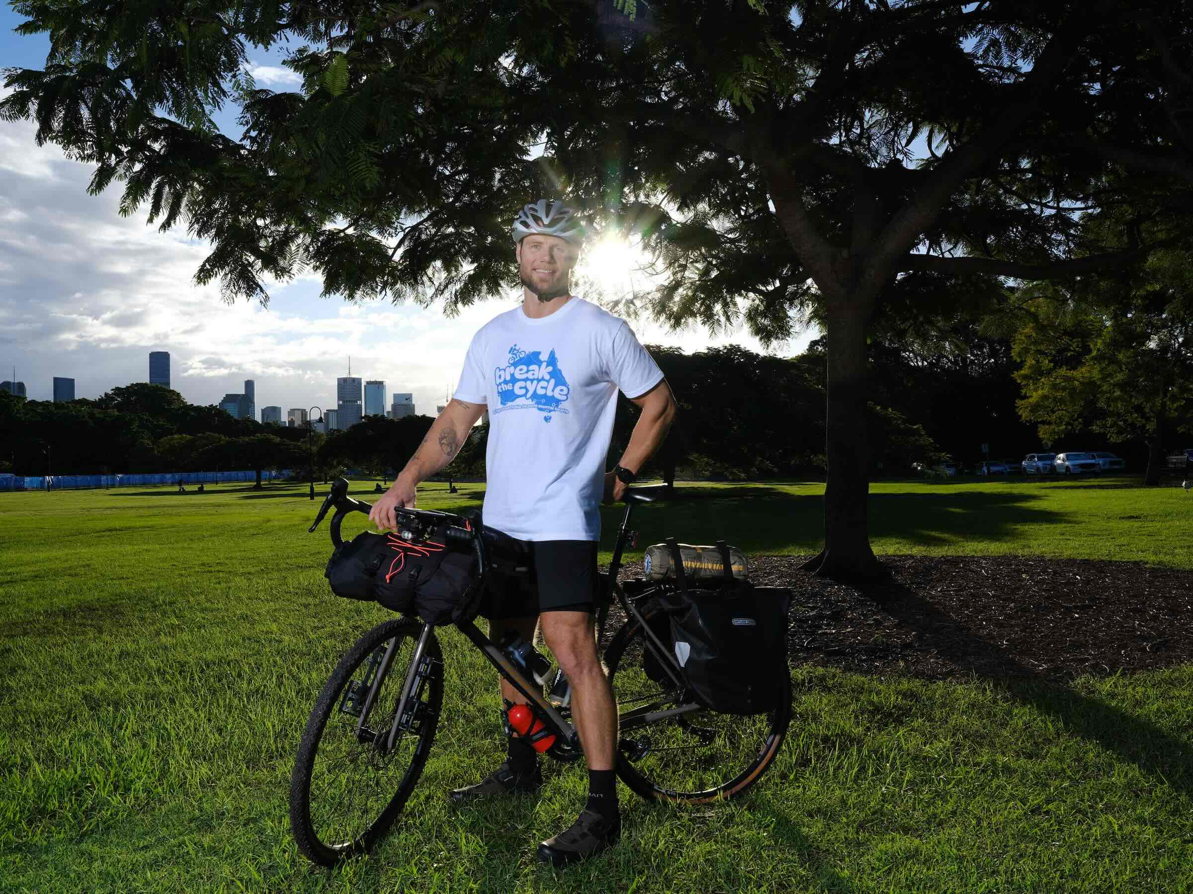 Paul James pictured in front of his bike in his home city of Brisbane