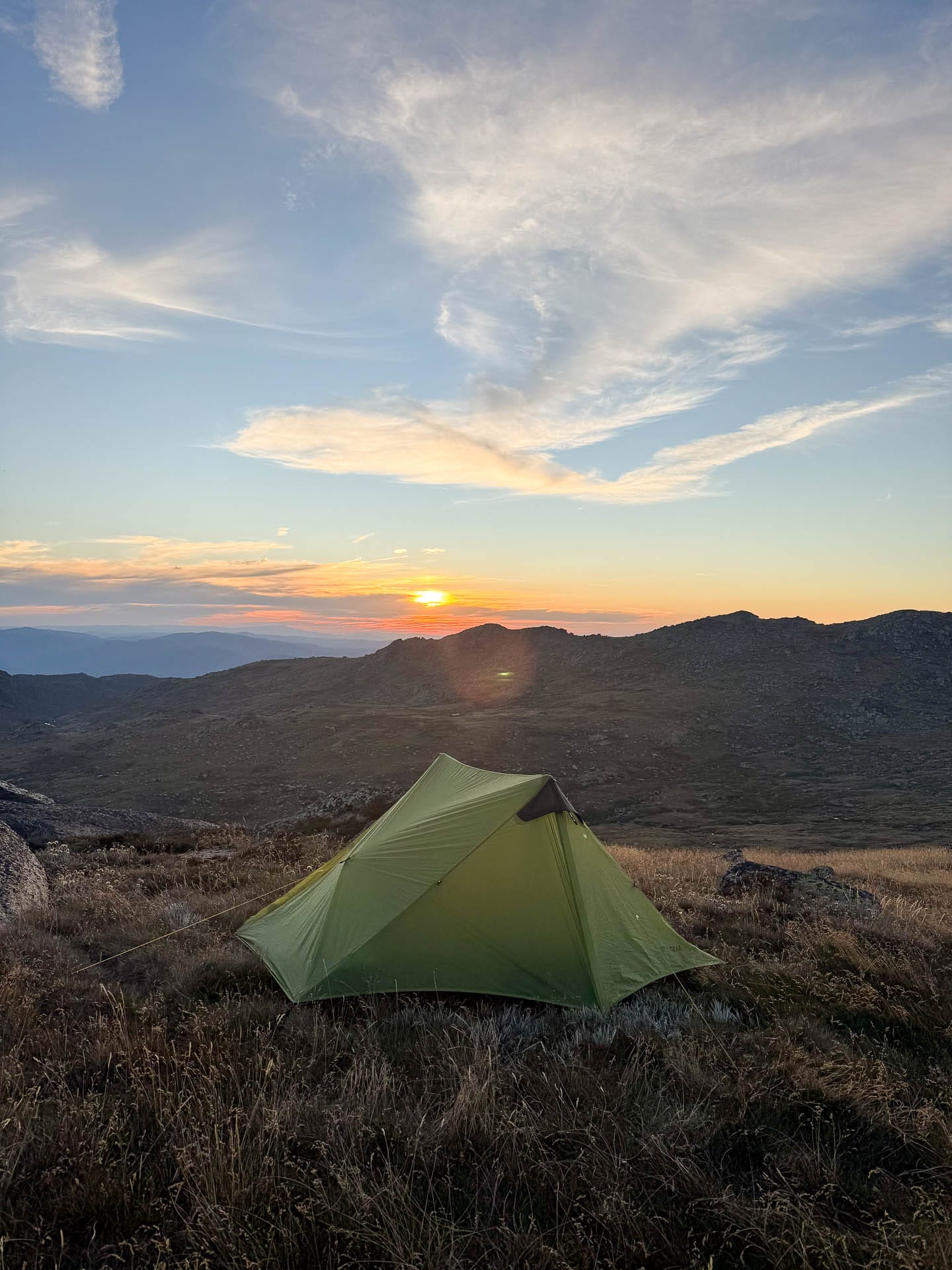 This Cosy Cabin Is the Perfect Year-Round Snowy Mountains Recharge, photo by tim ashelford, muellers peak, sunset, tent, camping, snowy mountains, koscisuzko national park, nsw