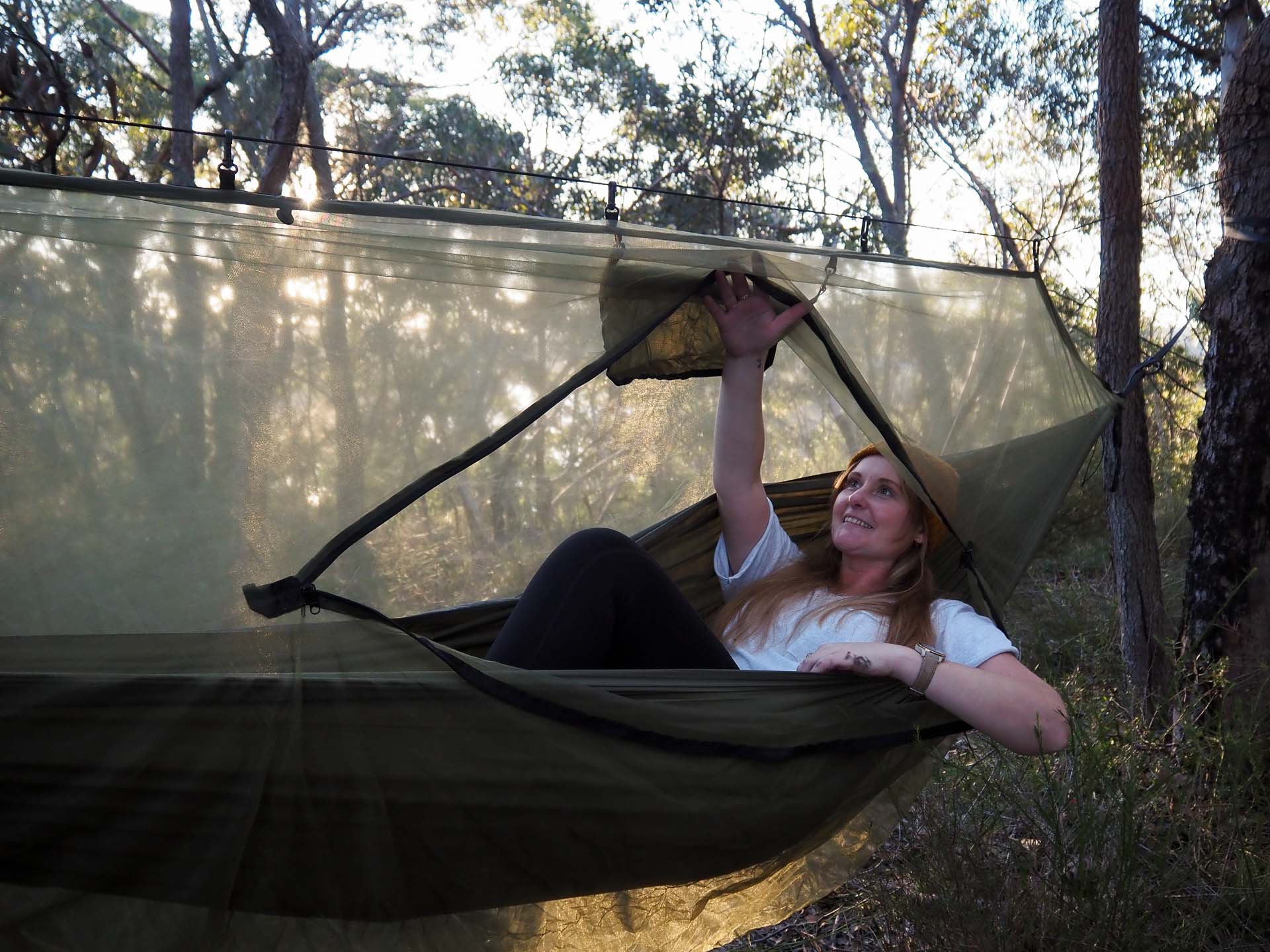 Alton Ultralight Camping Hammock Set – Reviewed & Tested, Anna Wall in hammock, photo by Tim Ashelford, sunset