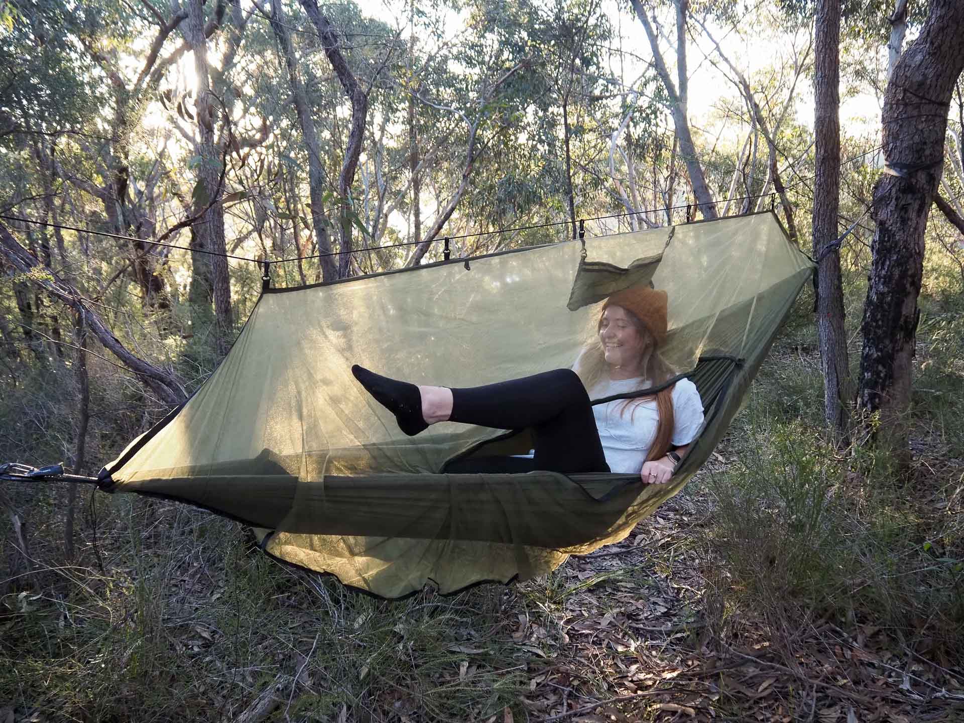 Alton Ultralight Camping Hammock Set – Reviewed & Tested, Anna Wall in hammock, photo by Tim Ashelford, sunset