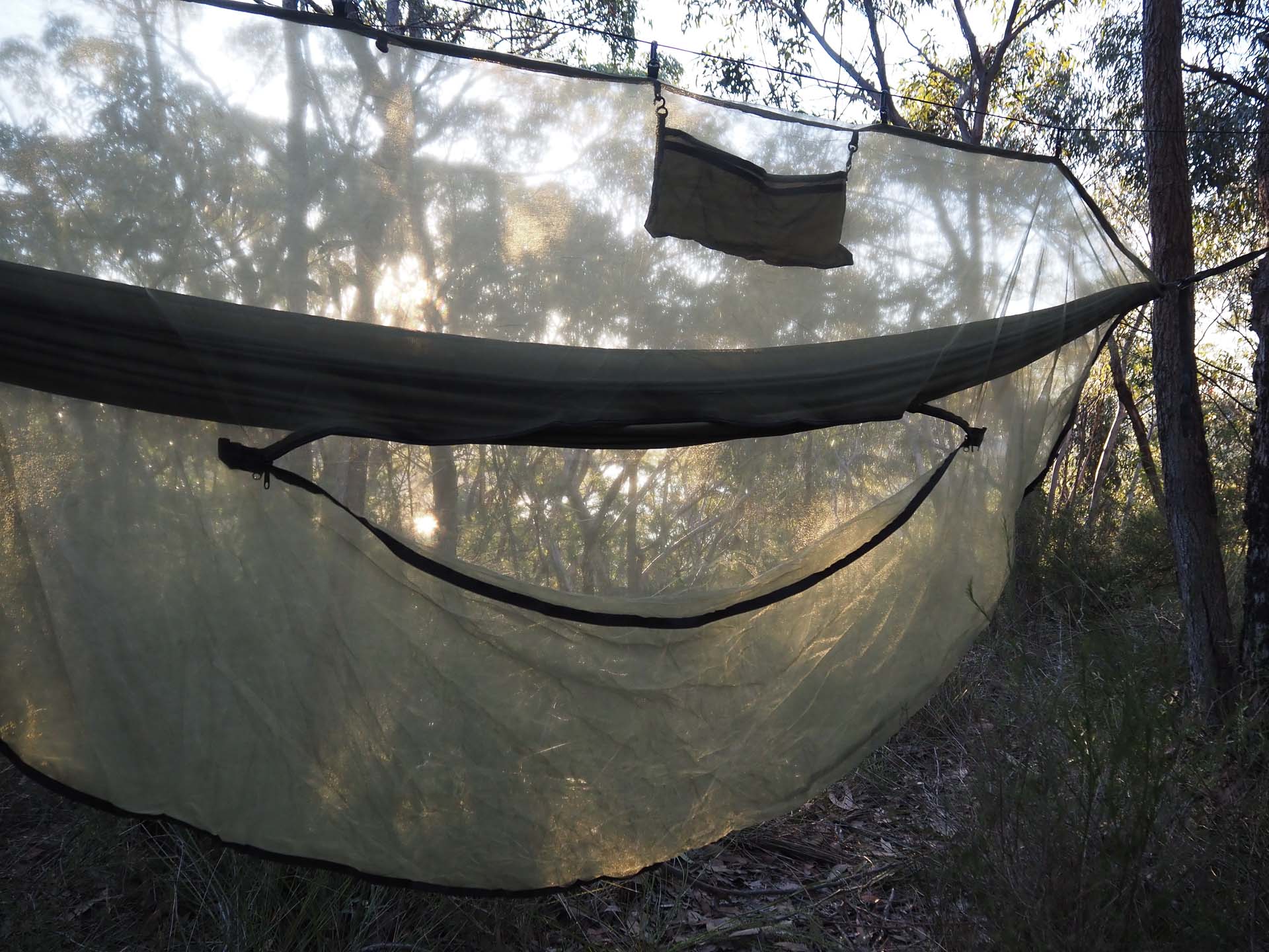 Alton Ultralight Camping Hammock Set – Reviewed & Tested, Anna Wall in hammock, photo by Tim Ashelford, sunset