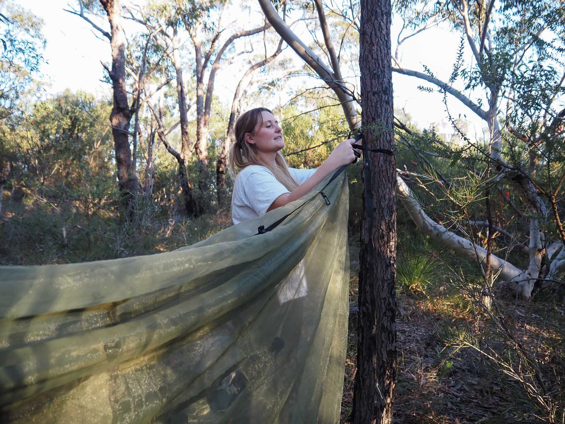 Alton Ultralight Camping Hammock Set – Reviewed & Tested, Anna Wall in hammock, photo by Tim Ashelford, sunset