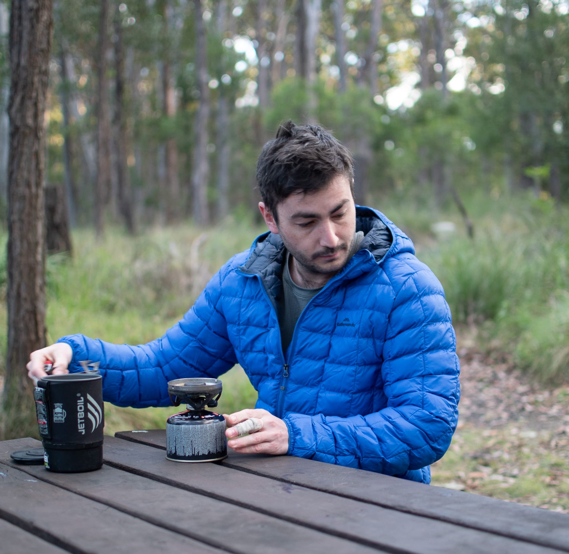 Kathmandu Heli Down & Insulated Jackets – Tested & Reviewed, photos by Andrew Moore, model Aidan Howes, camping, puffer jackets, stove, coffee