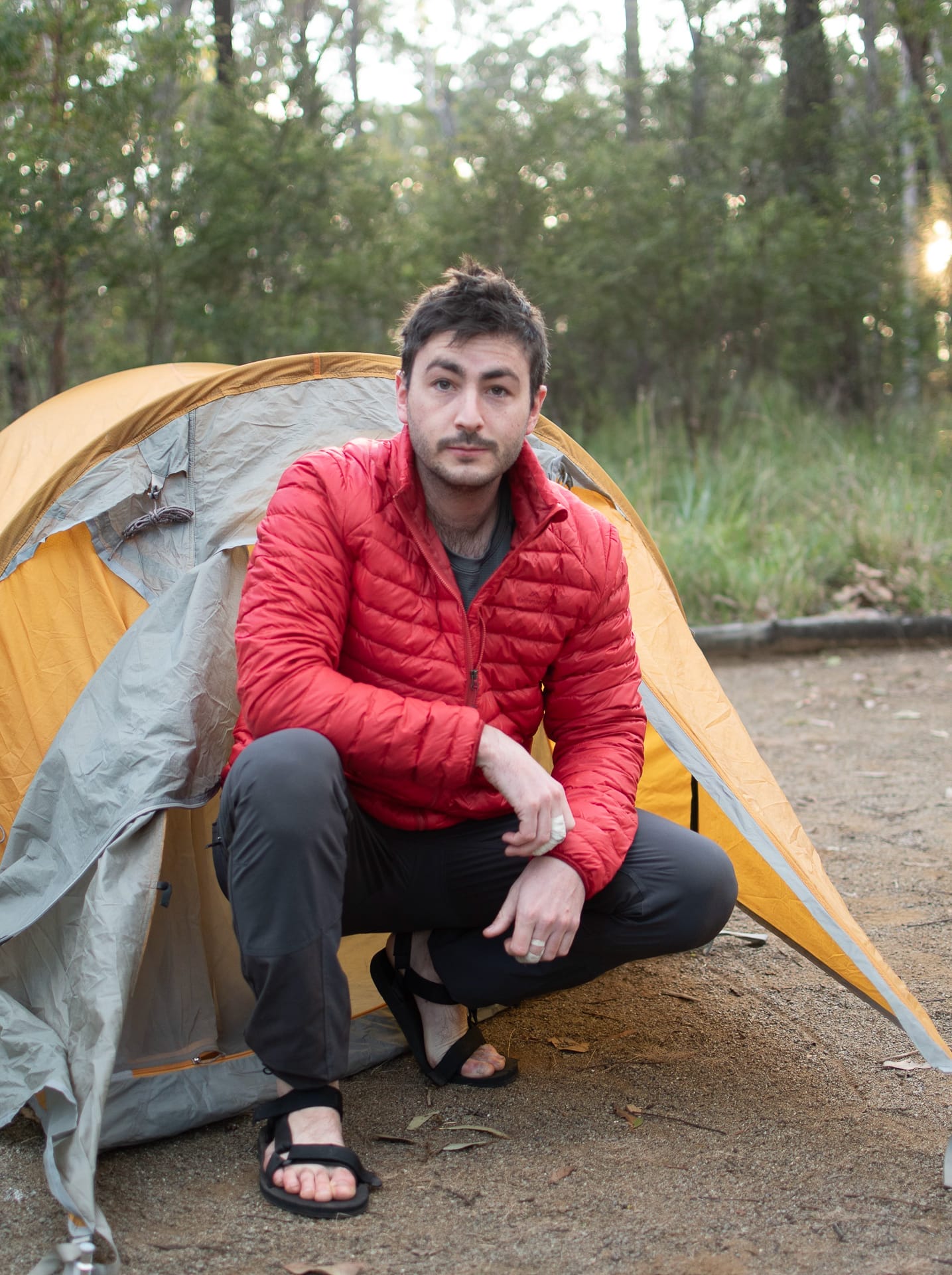 Kathmandu Heli Down & Insulated Jackets – Tested & Reviewed, photos by Andrew Moore, model Aidan Howes, camping, puffer jackets, tent