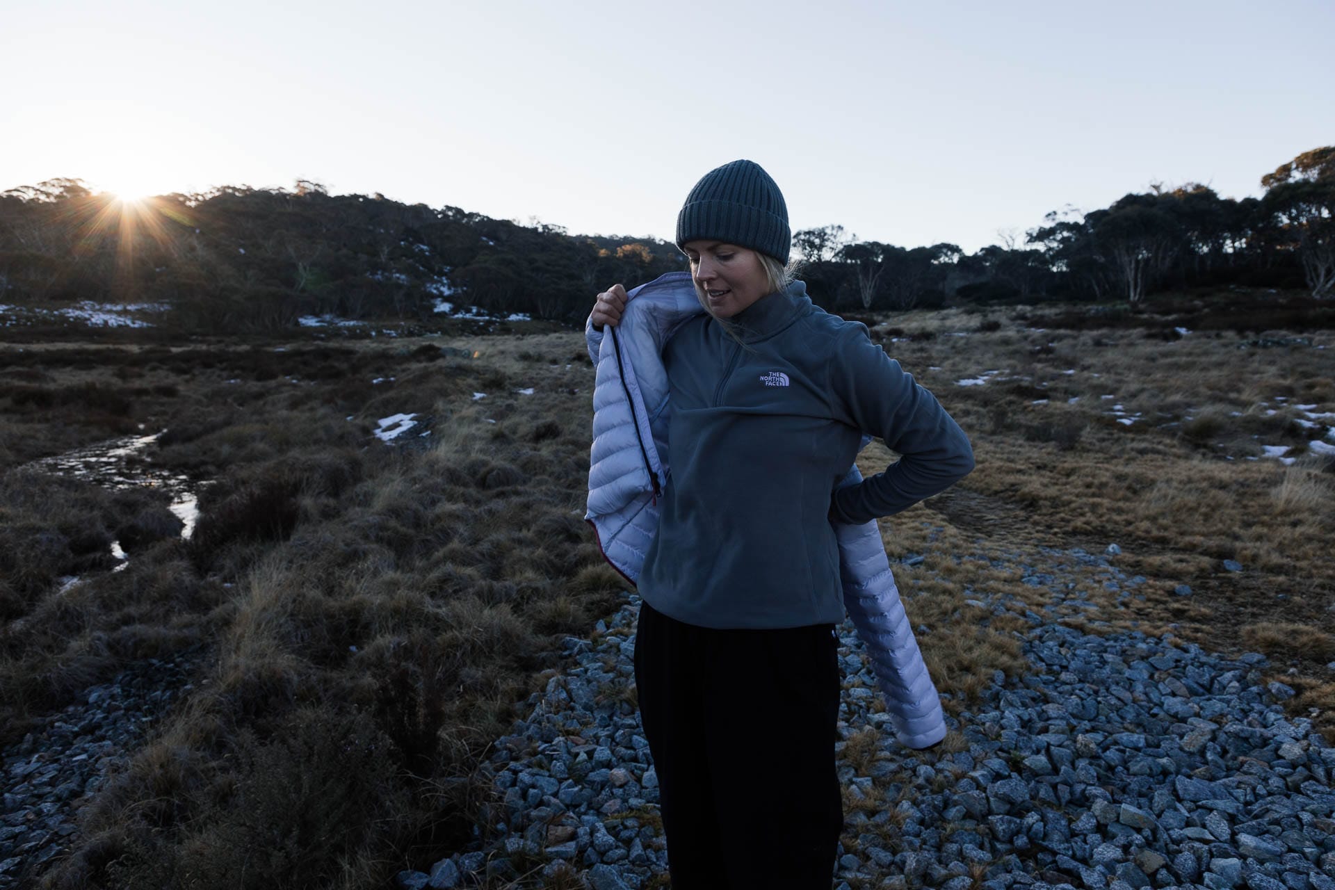 Winter Layering for the Outdoors – Our Layer-by-Layer Guide, photo by Matt Wiseman, Model Rachel Holland, NSW, Kosciuszko, snowy mountains, puffer jacket