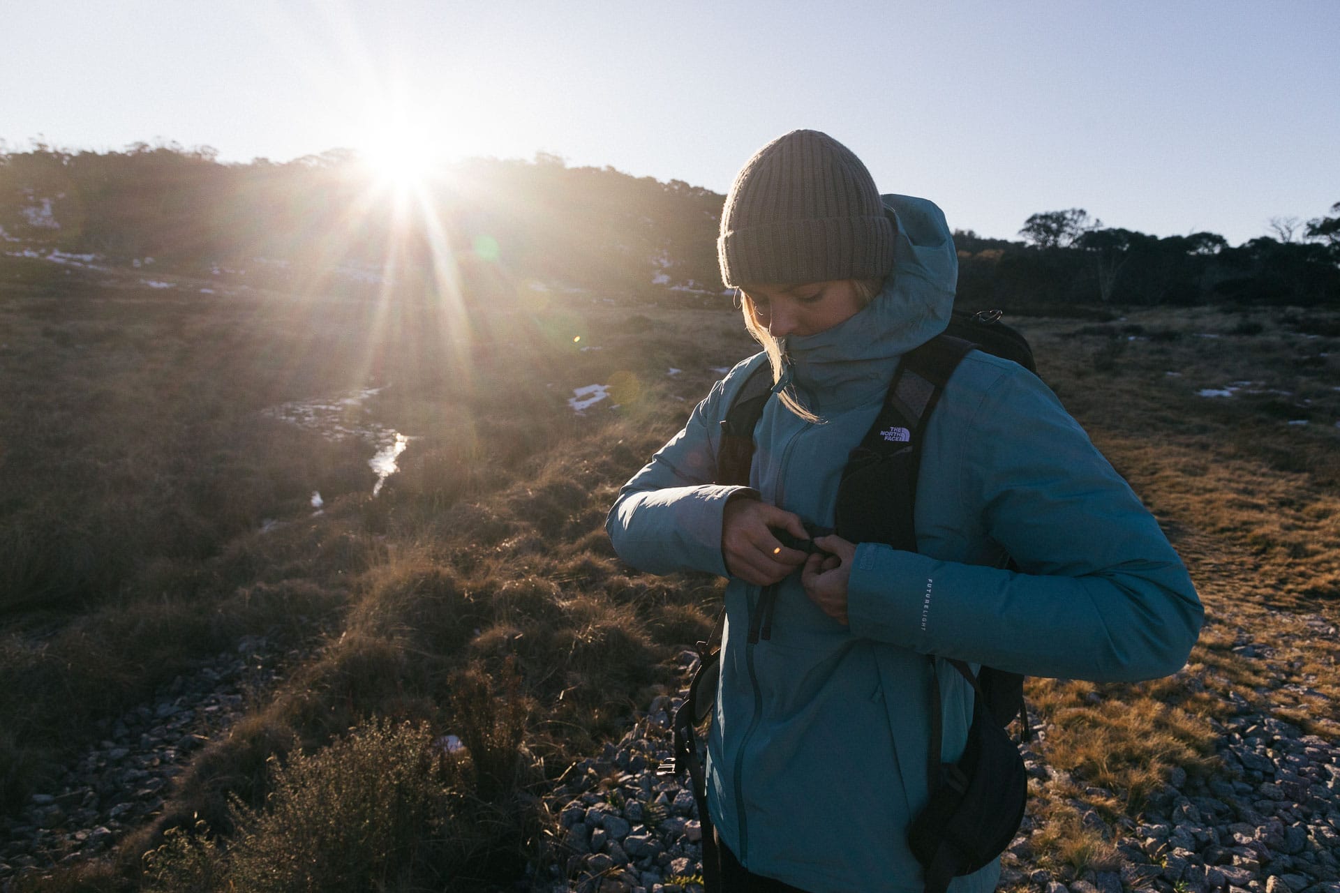 Winter Layering for the Outdoors – Our Layer-by-Layer Guide, photo by Matt Wiseman, Model Rachel Holland, NSW, Kosciuszko, snowy mountains, sunrise