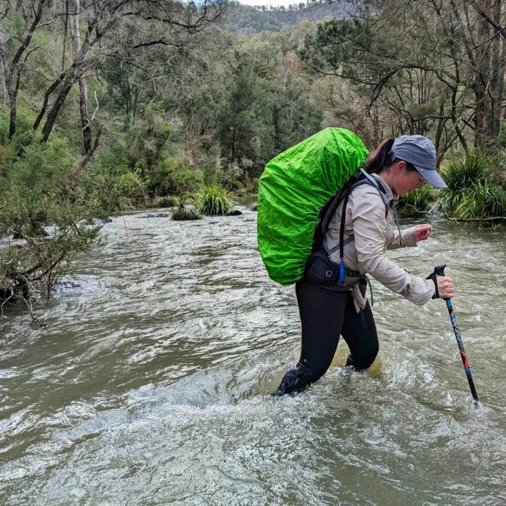 The Green Gully Track is NSW's Only Official Hut-to-Hut Multi-Day Hike, Emma Griffiths, creek crossing, river, hiking poles