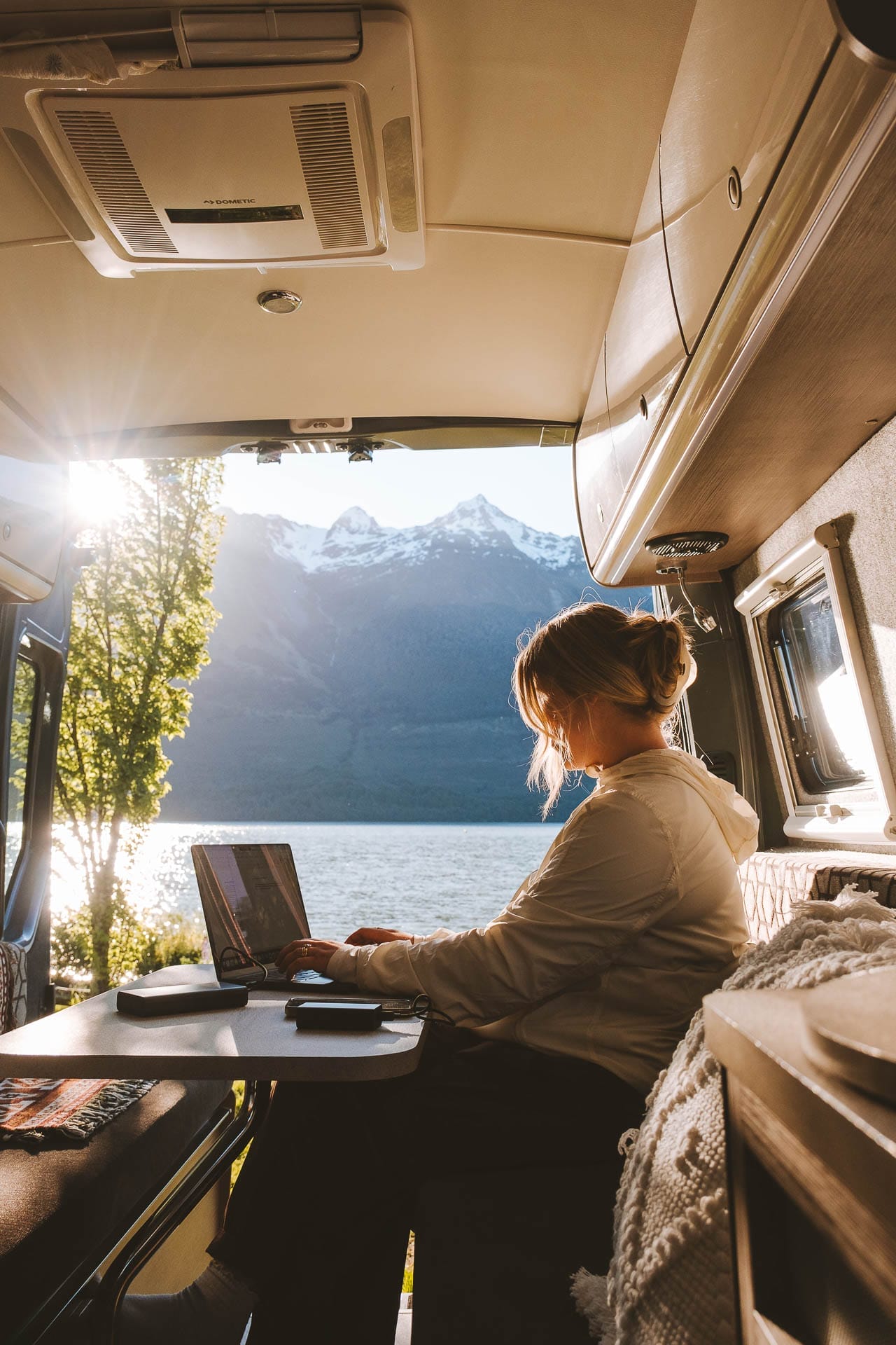 Life Unplugged: How I Stay Powered on the Road, Sophie piearcey, mophie, new zealand, van, jayco, laptop, table, lake, mountain