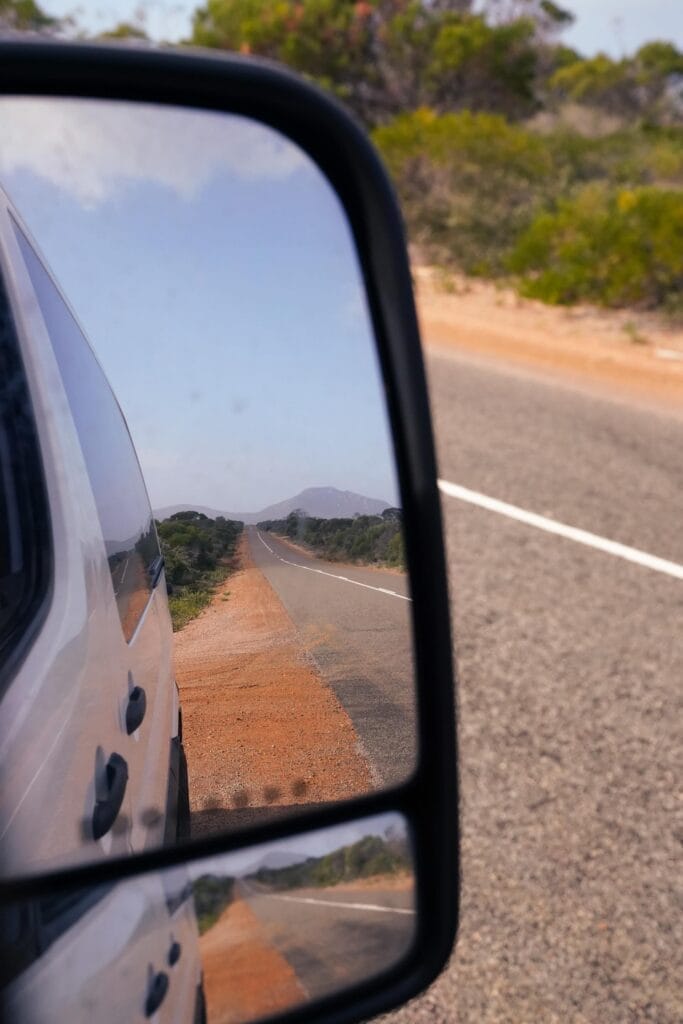 WA's Fitzgerald River National Park Combines Beaches, Mountaintops, & Flora Not Found Anywhere Else, Amy Naylor, campervan, mirror, reflection, road, mountain, film photo