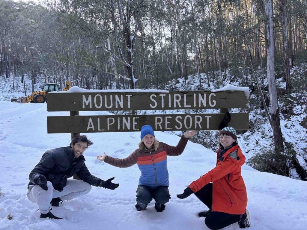 Mount Stirling Alpine Resort, snow, winter, people, wooden sign, Victoria, Australia