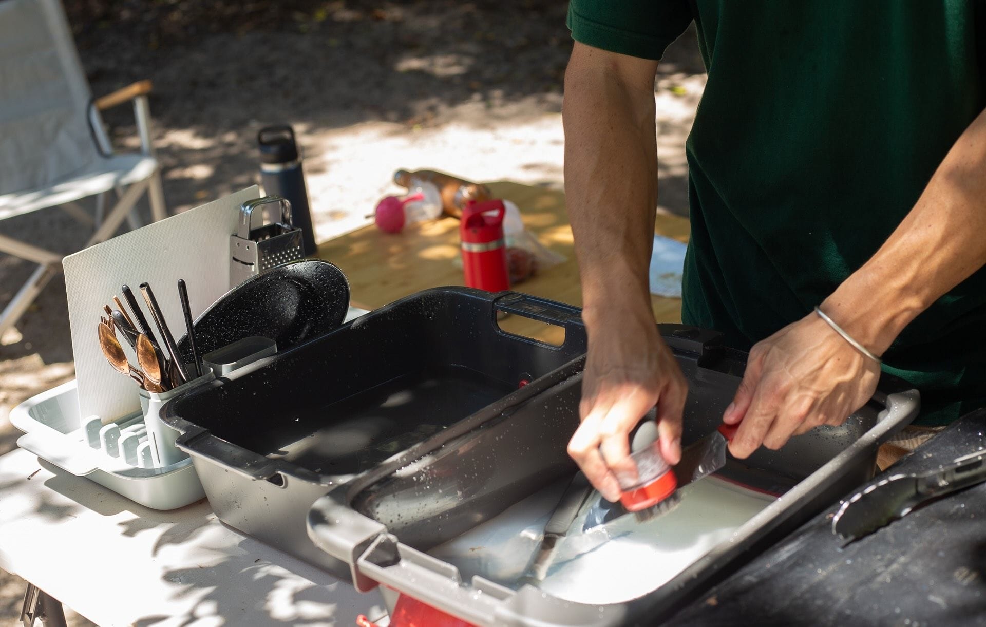 OXO Outdoor Wash Dry and Stow System, washing dishes, camp kitchen, portable sink, dish brush, drying rack, camping chores, outdoor