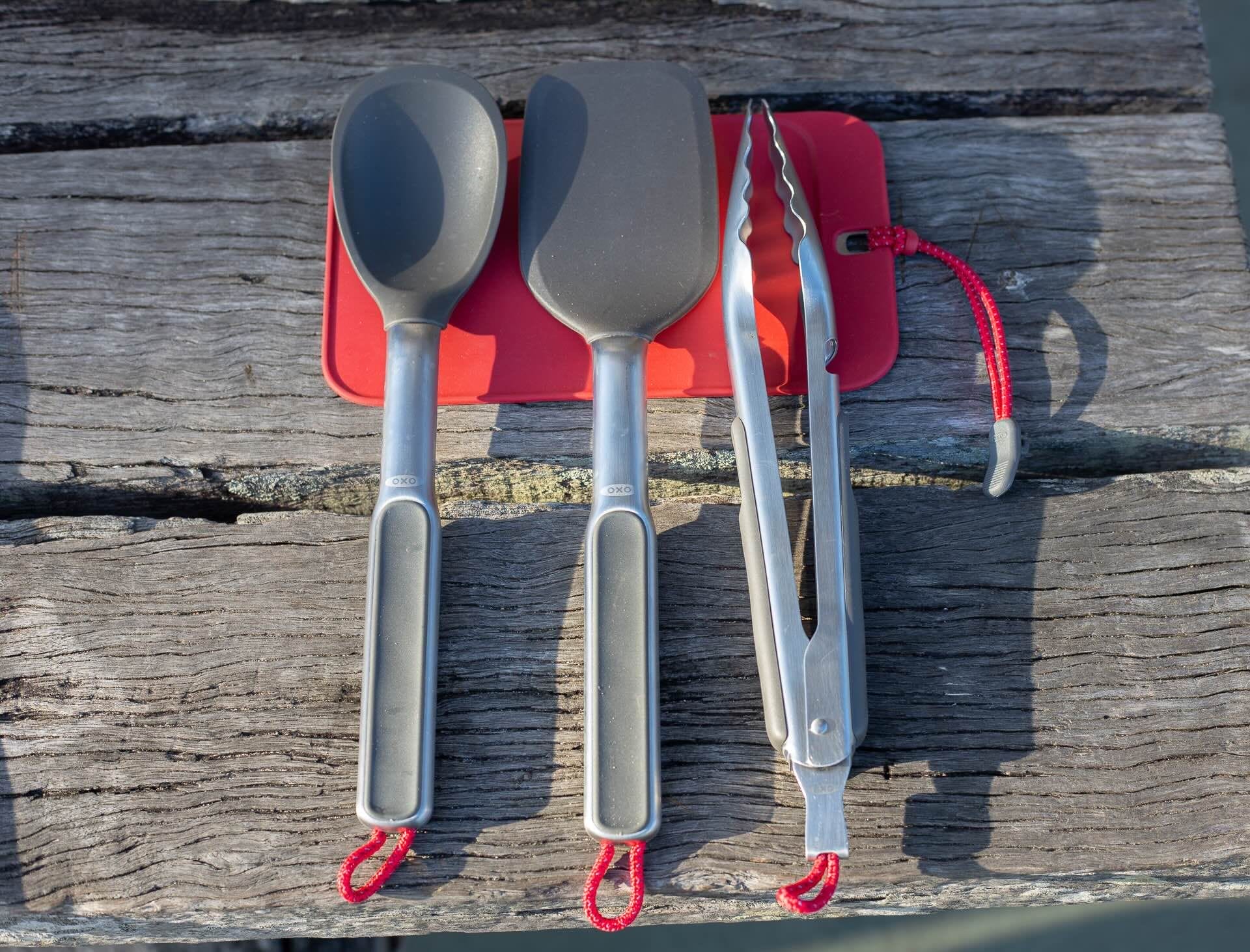 OXO camp kitchen utensils, spatula, ladle, tongs, red silicone mat, outdoor cooking equipment, camping