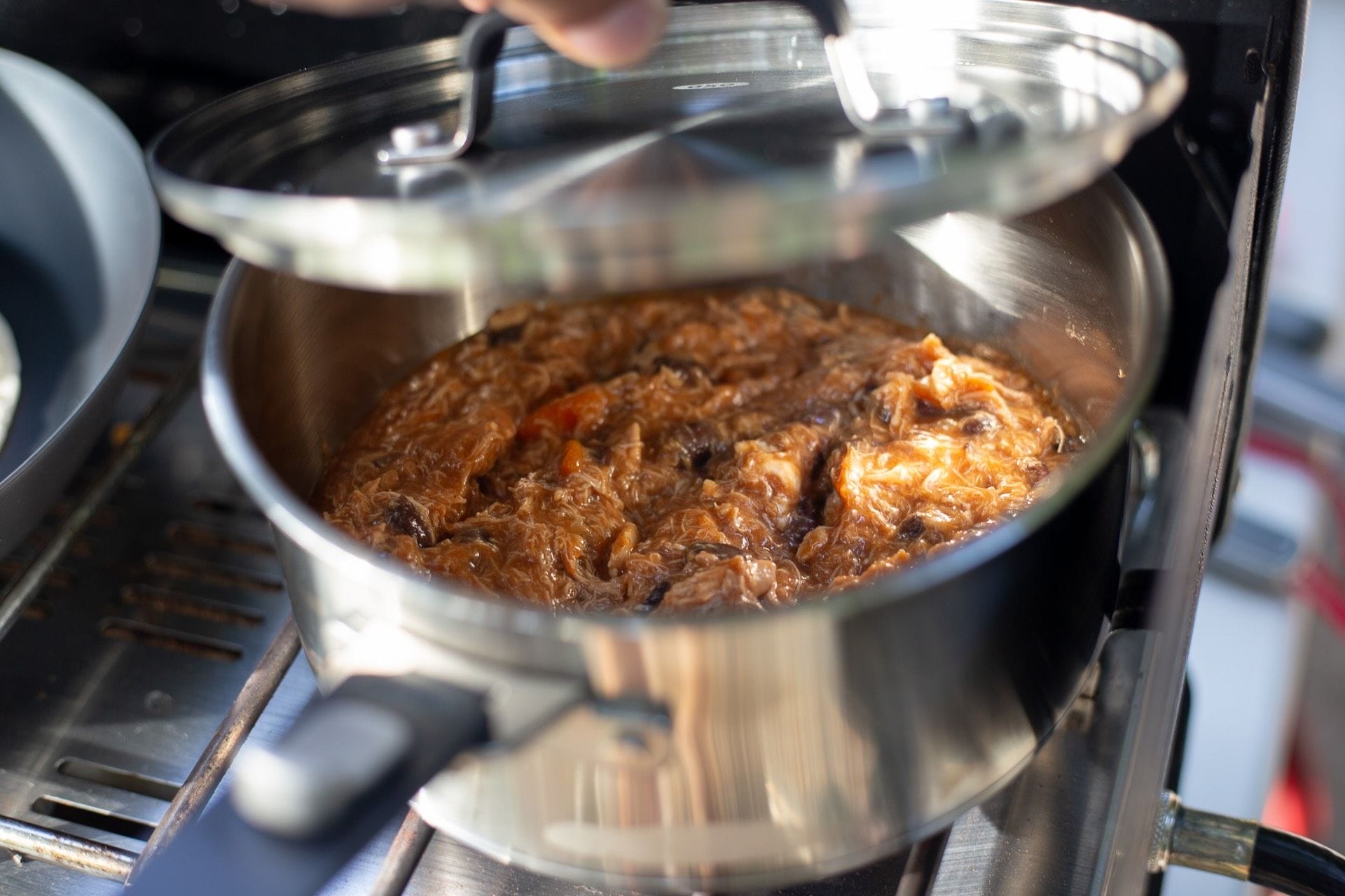OXO, camp kitchen, cooking, stainless steel pot, pulled pork, camping meal, hand lifting lid, camp stove, cookware, camping trips