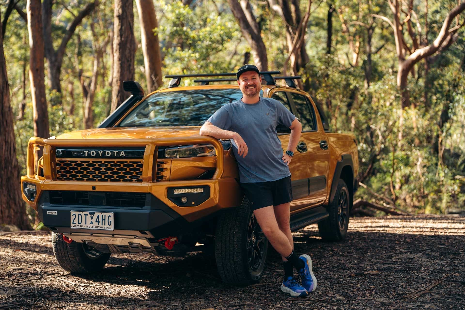 Toyota HiLux SR5, Tim, by PL Creative, burnt golden yellow ute, off-road, bullbar, snorkel, forest, 4WD adventure