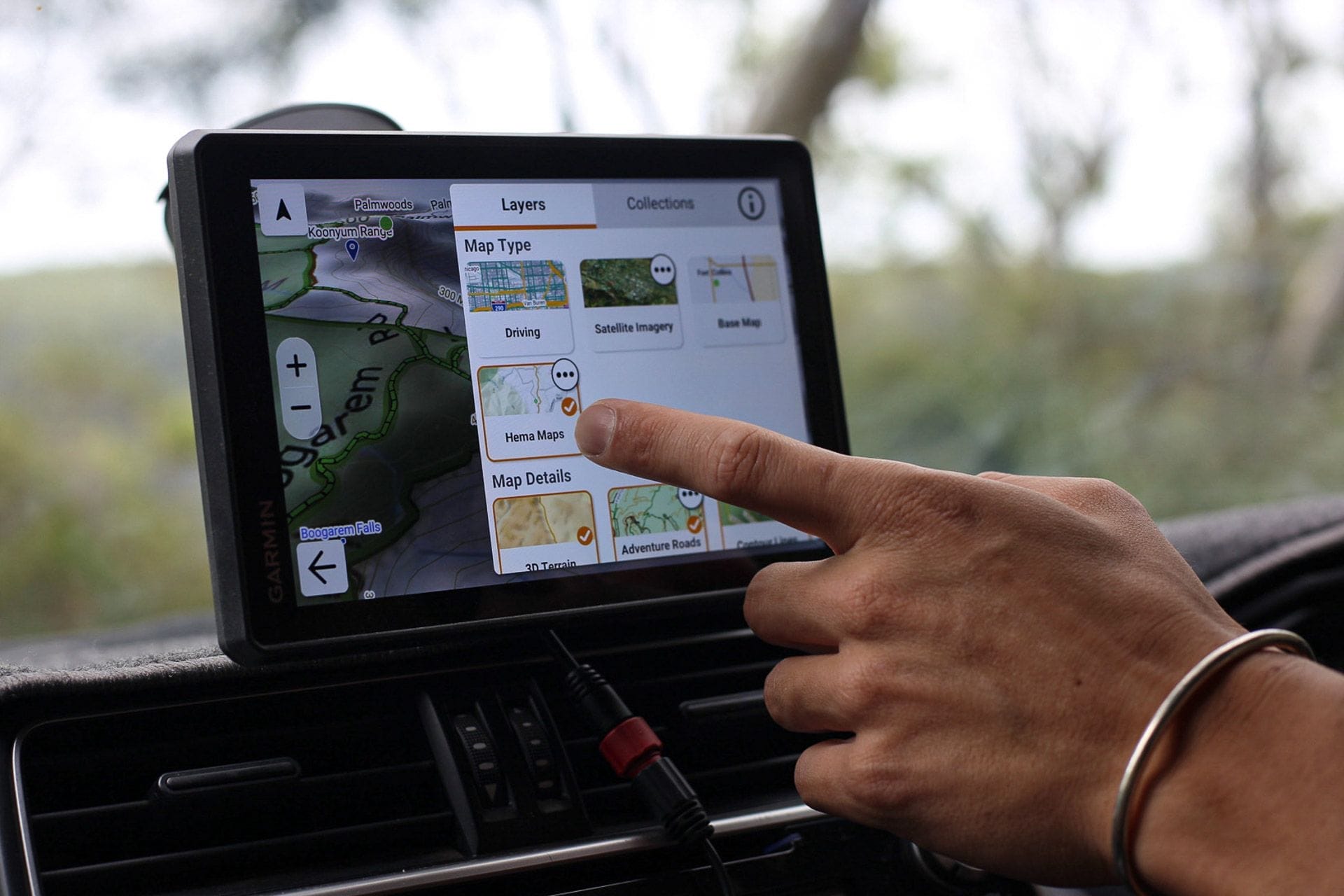 Garmin Tread 2 Overland Sat Nav, Hema Maps selection, touchscreen interface, car interior, off-road navigation, GPS layers