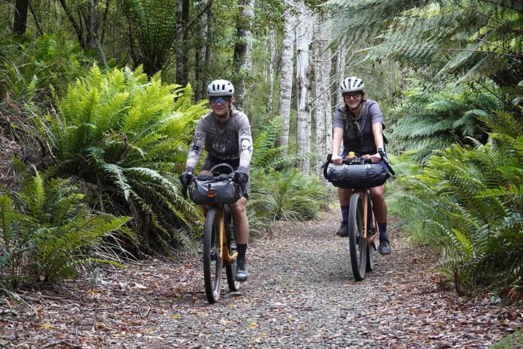 North-East Rail Trail, Tassie Traverse, Tasmania, by Rohan Hunt, bikepacking, cyclists, lush temperate rainforest, gravel path, ferns, cycling adventure
