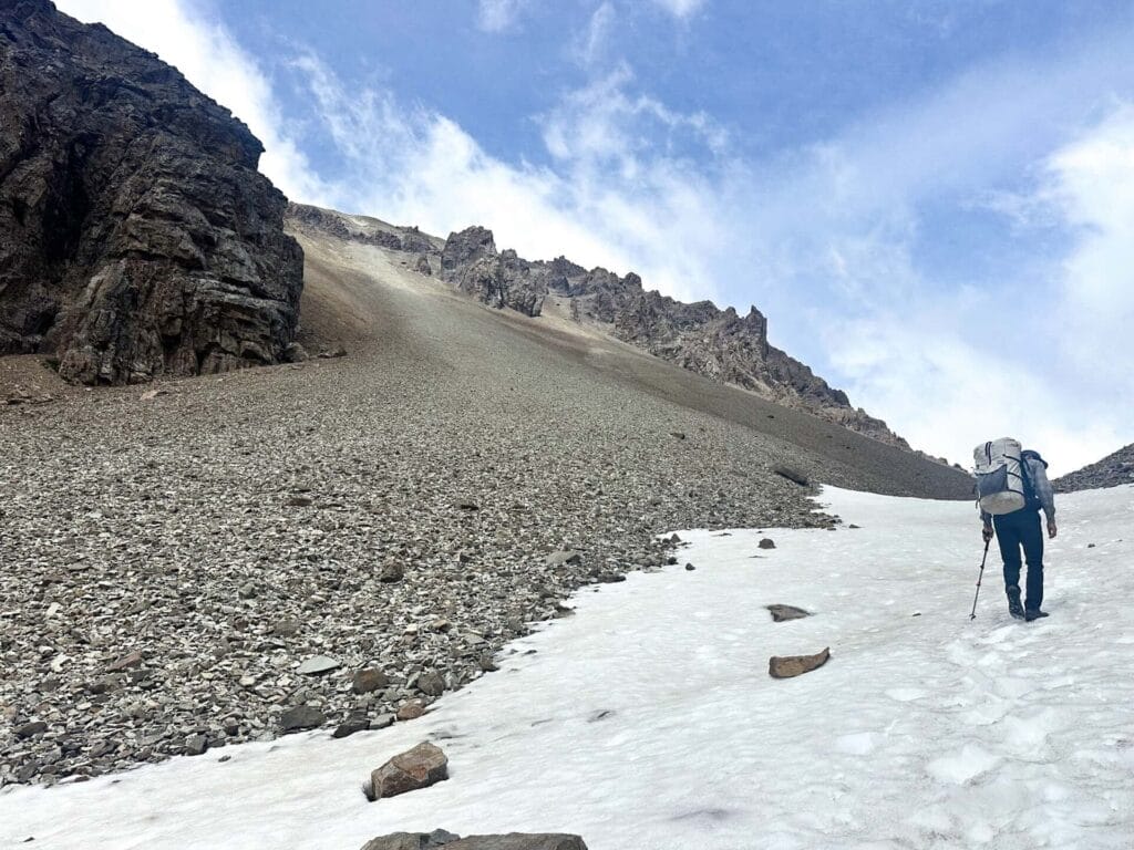Cerro Castillo National Park, Patagonia, Las Horquetas Trek, hiker, trekking, snow, scree slope, mountains, scenic