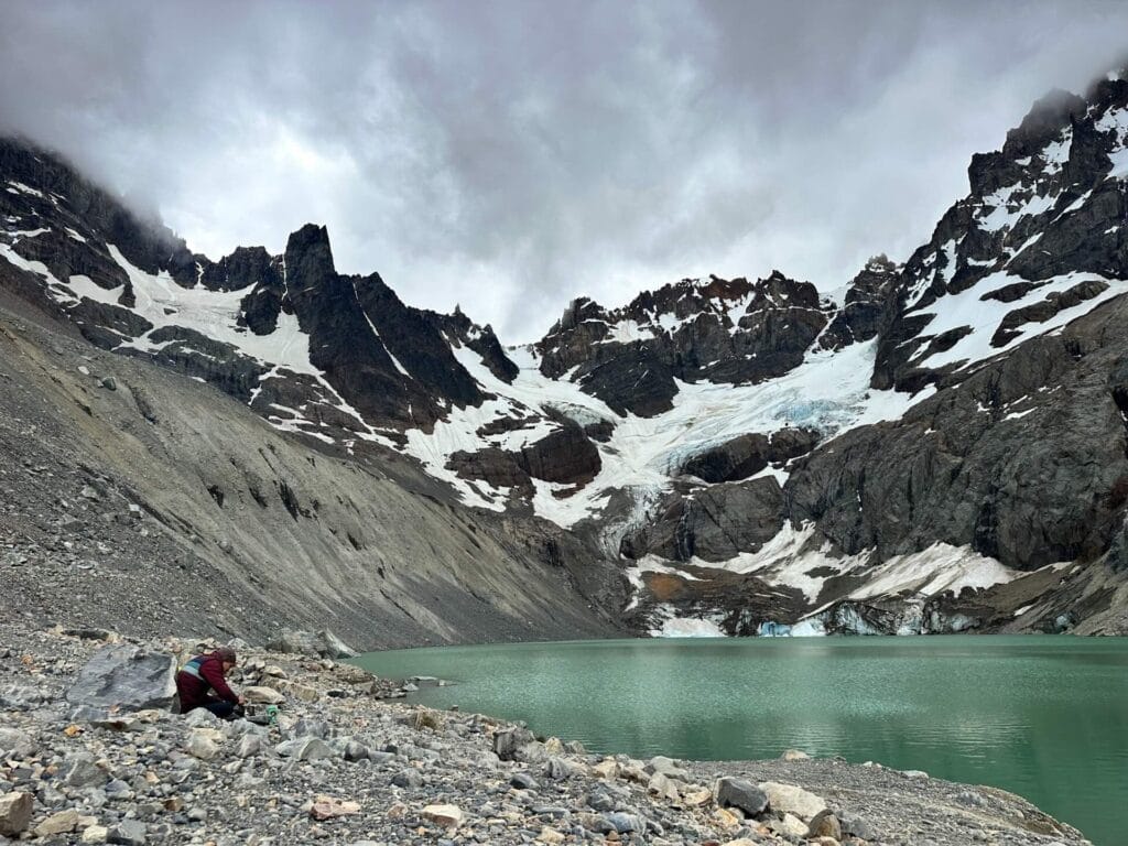 Glacial lake, Cerro Castillo National Park, Patagonia, Chile, by Bea, hiker, mountains, snow, glacier, turquoise water, cloudy sky, rugged landscape, Las Horquetas Trek