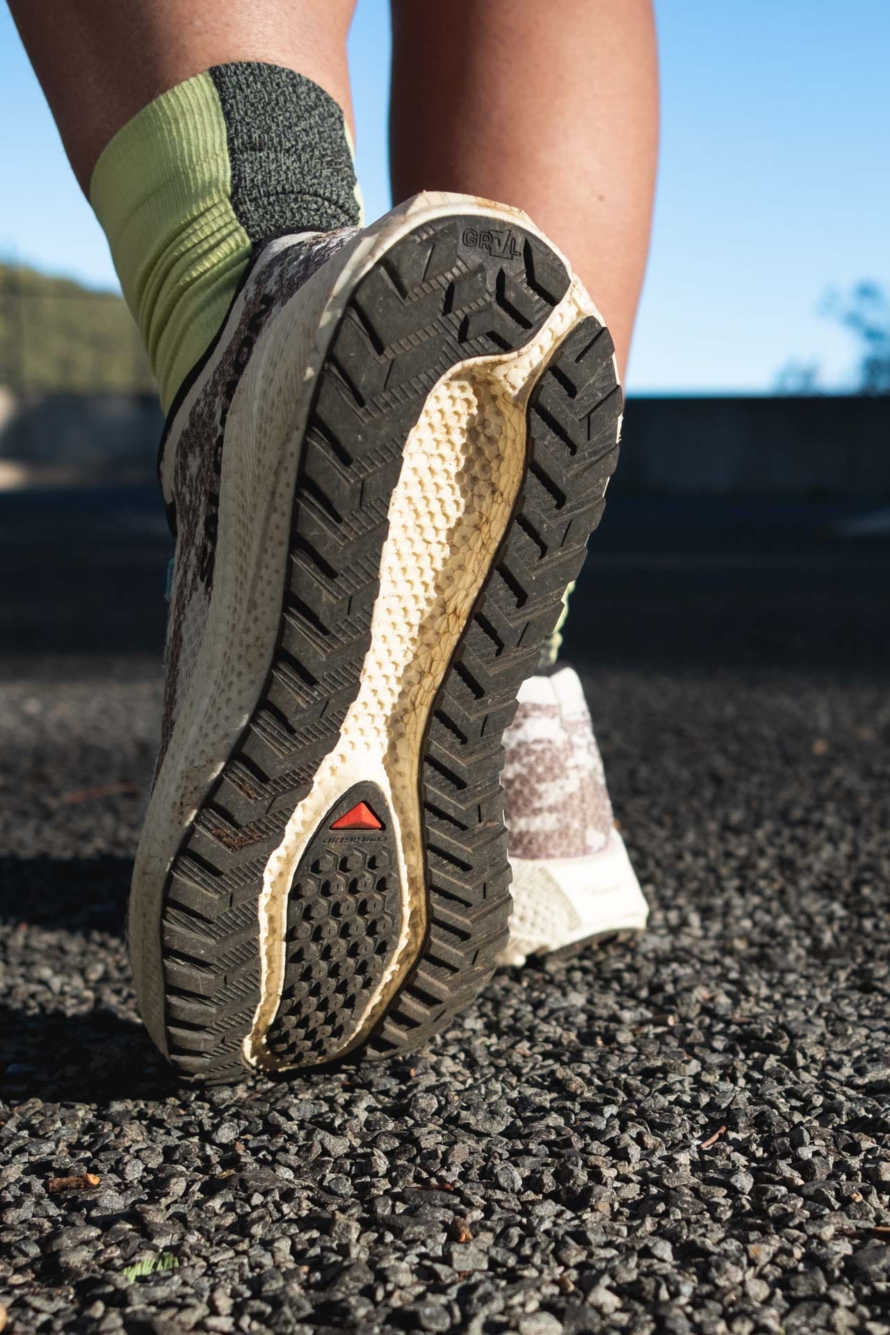 Salomon Aero Glide 4 GRVL – Reviewed & Tested, photo Lachie hand, model Ella Garbett, trail running, gravel running, shoe