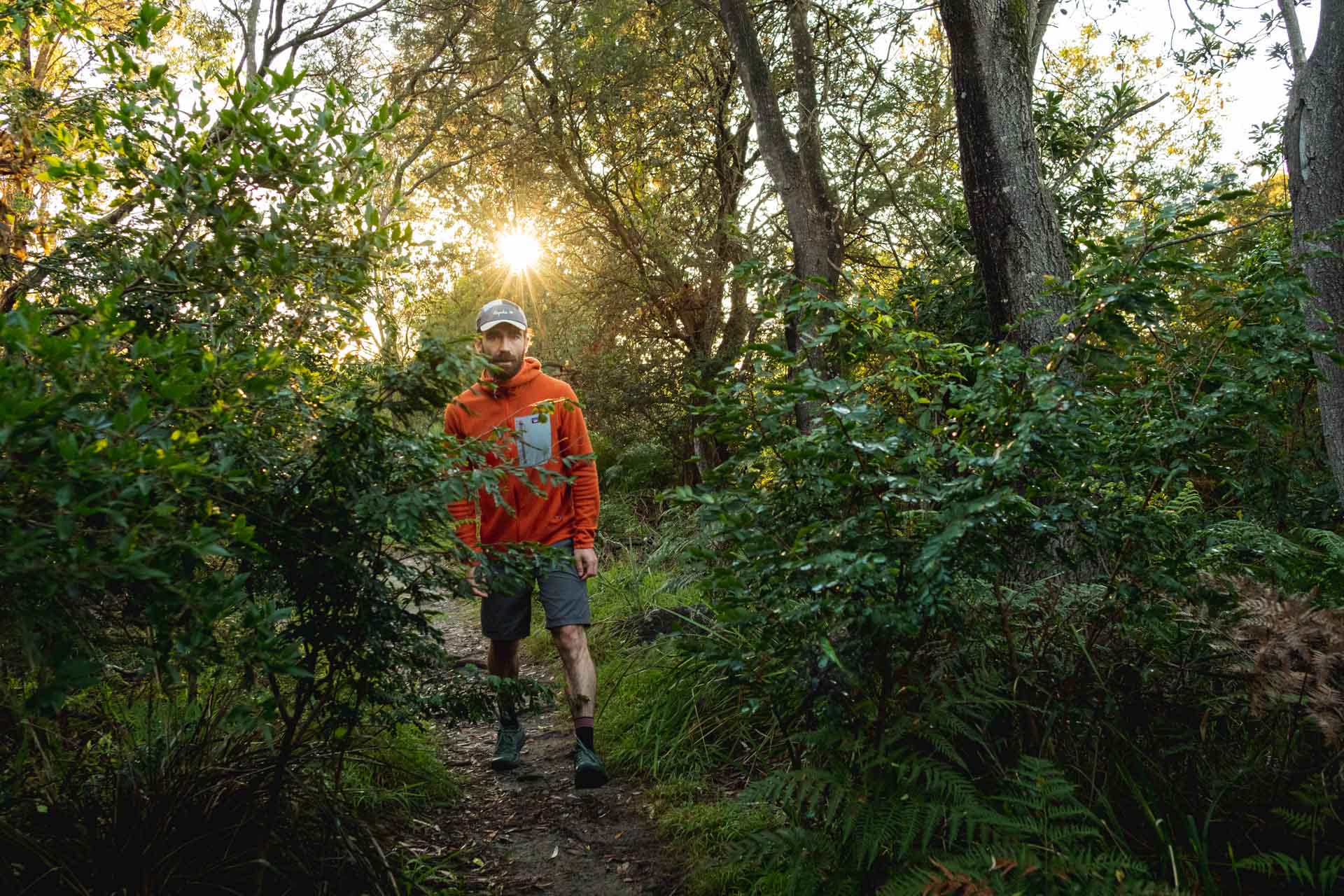 Why Every Explorer Needs a Technical Fleece Like This One, photo by Ella Garbett, model Lachie Hand, R1 Air fleece, orange, sunrise