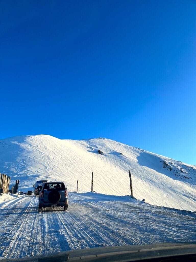 Mt Hutt access road, Tim Whale, snowy alpine road, winter driving, New Zealand, South Island ski field, rugged mountain pass